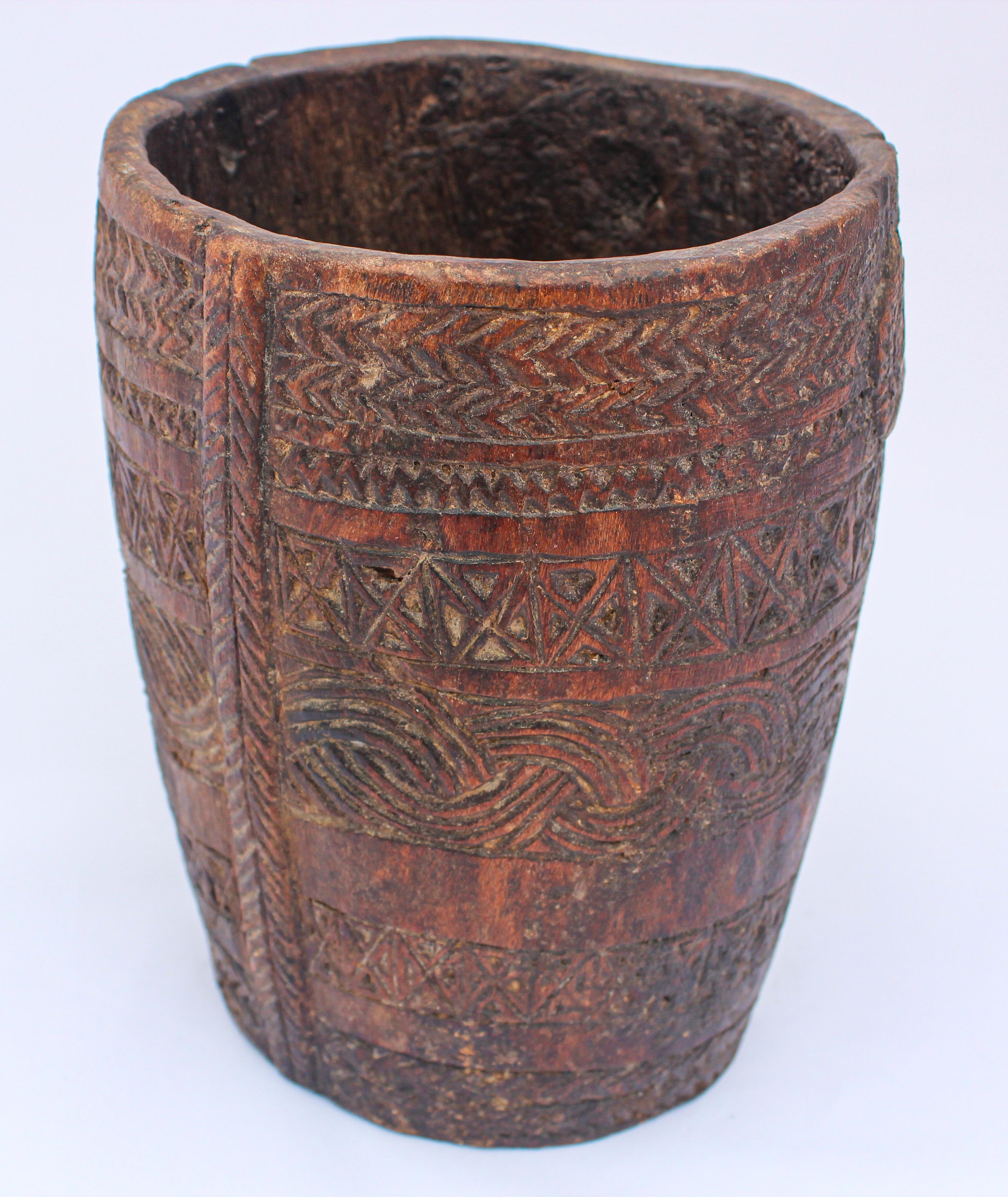 Hand Carved Tribal Wooden Nepalese Beaker Milk Pot with Handle In Fair Condition For Sale In North Hollywood, CA