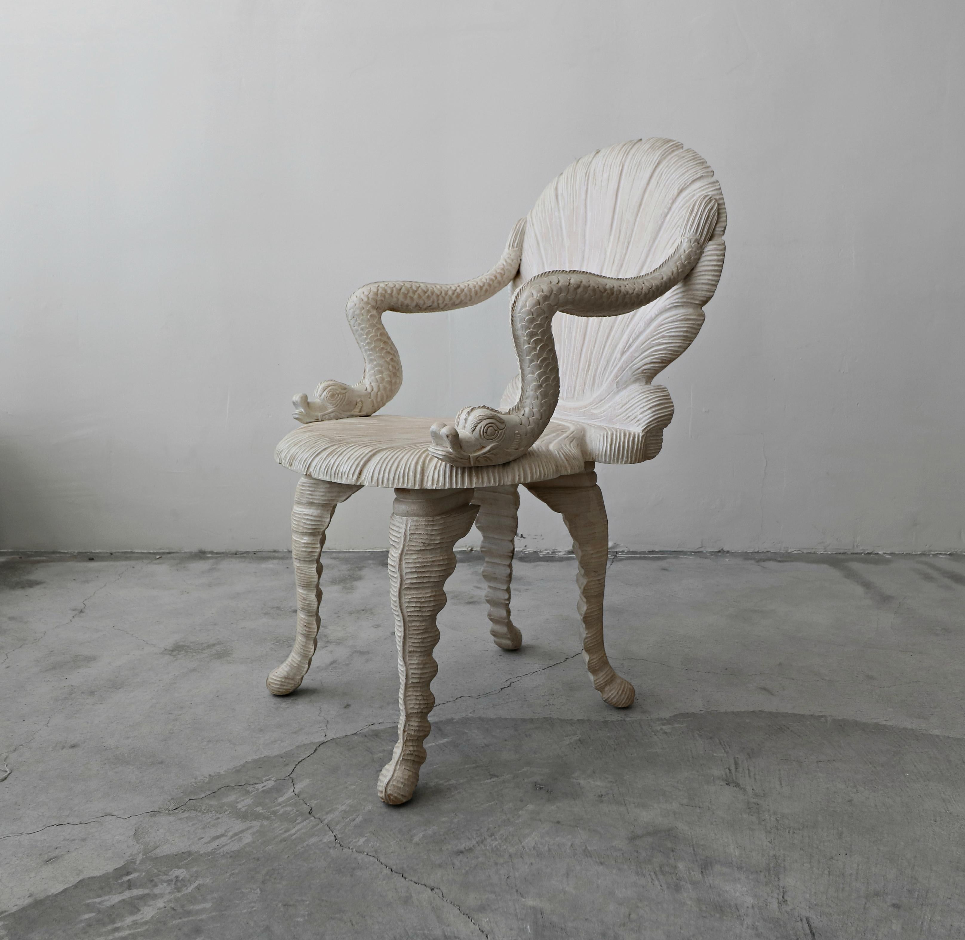 A perfect piece of art. Hand carved and incredible. This grotto style chair is nothing short of amazing. Carved from solid wood it is incredibly heavy and has the most pristine details. It is totally functional but we prefer to appreciate it as the
