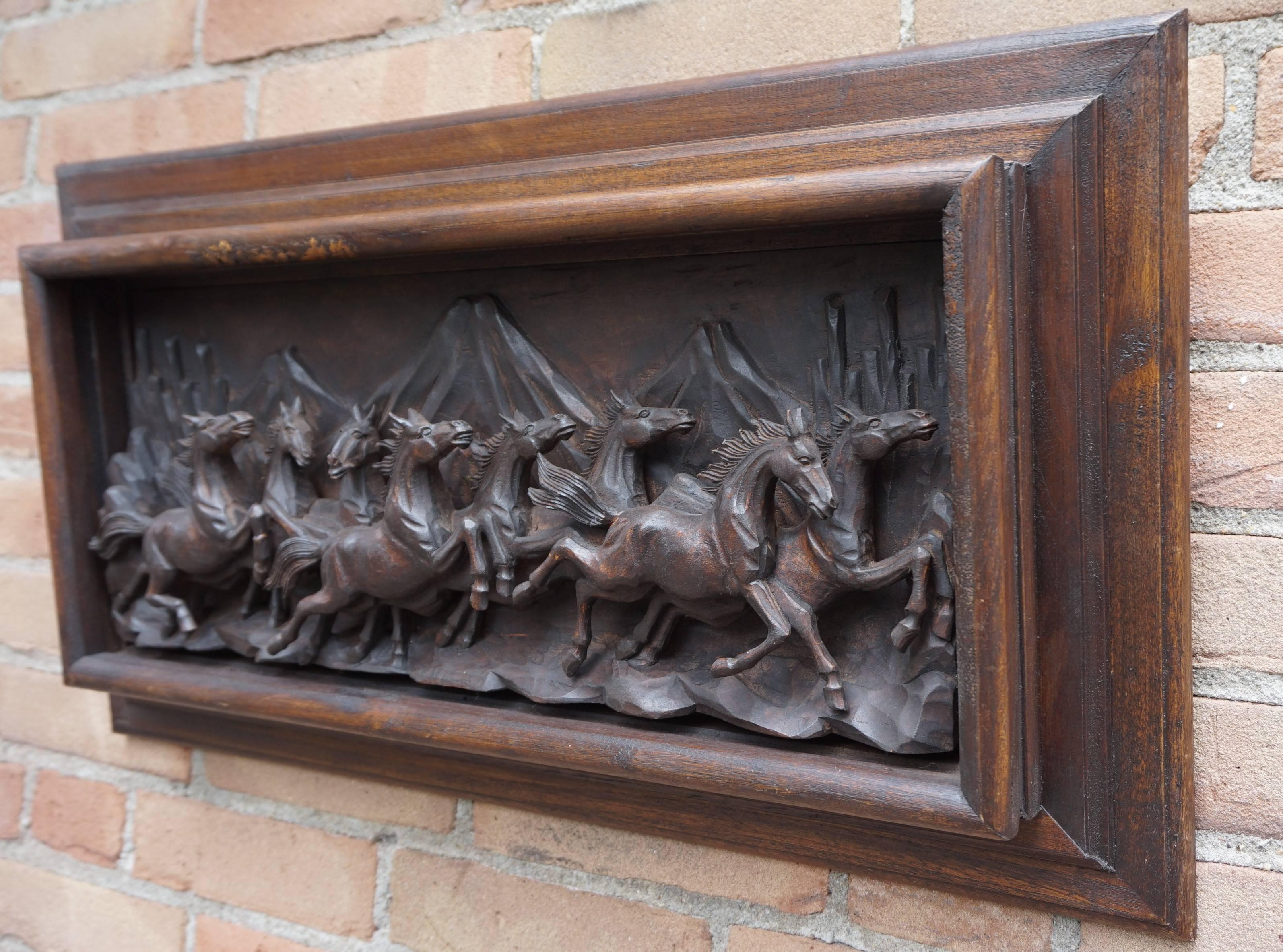 For the lovers of horses and horse related art.

This midcentury made wall plaque depicts a beautiful scene of eight galloping wild horses with a mountain range against the background. The relief is incredibly deep which creates an extra impressive