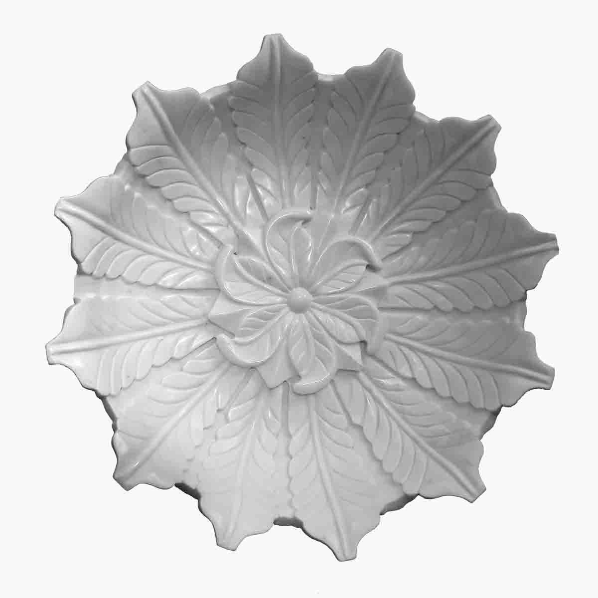 A hand-carved white marble bowl from India, circa 1960. The intricate, delicately carved leaf details and the quality of the marble combine to make this bowl a stunning piece of home decor. Ideal as dramatic accent to any coffee table, dining table