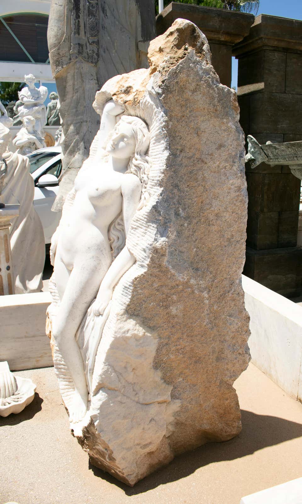 Hand-Carved Hand Carved White Marble Female Sculpture on a Single Block For Sale