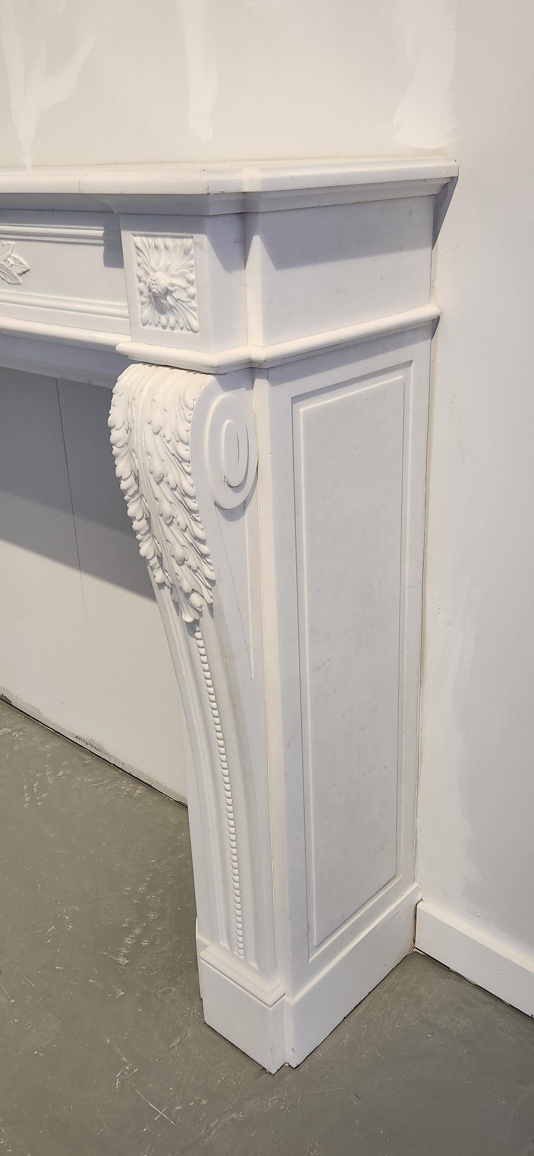 Hand-Carved White Marble Fireplace Mantel in the Regency Style In Good Condition For Sale In Chicago, IL