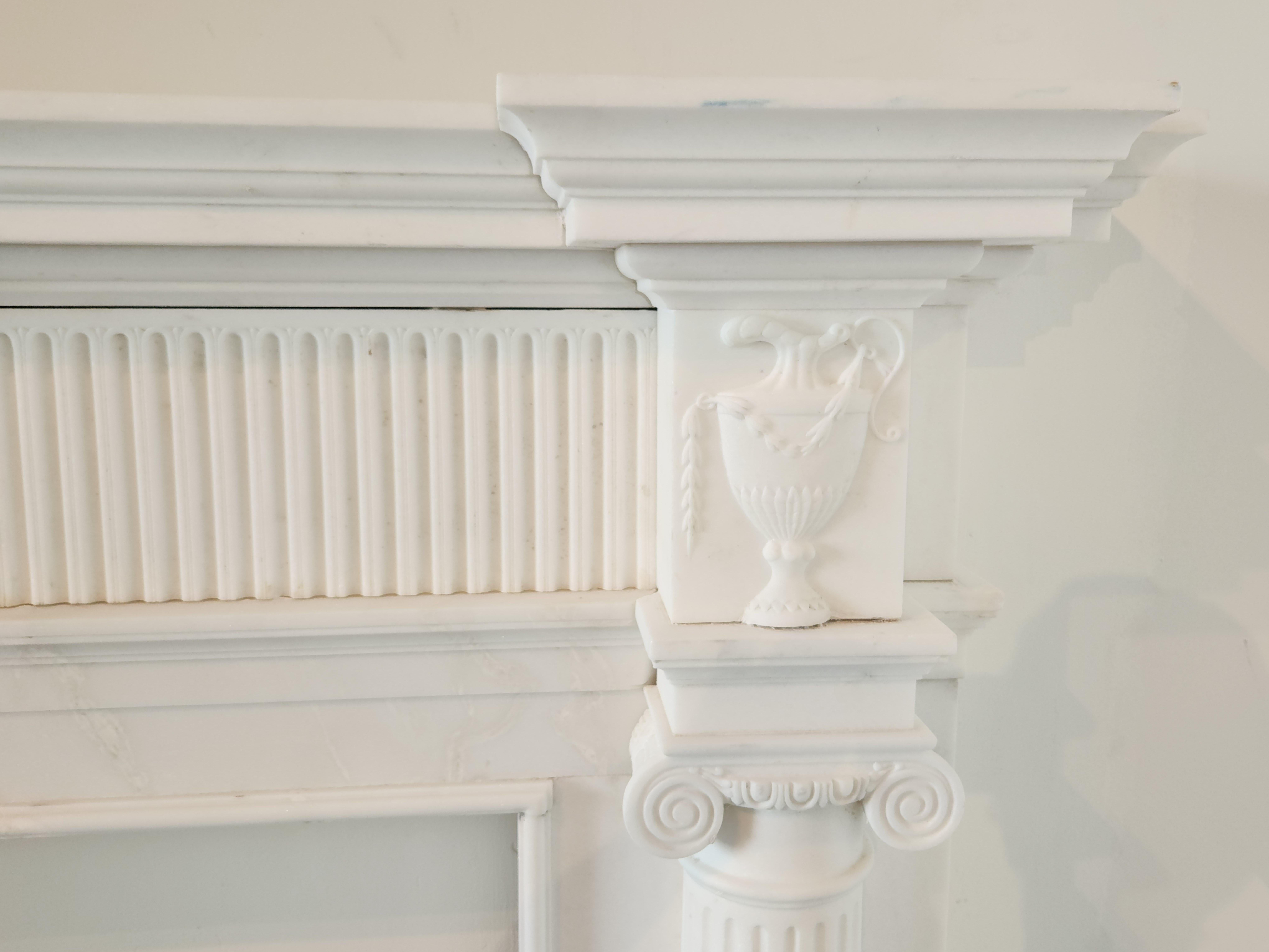 Hand-Carved White Marble Fireplace Mantel with Fluting in the Regency Style For Sale 1