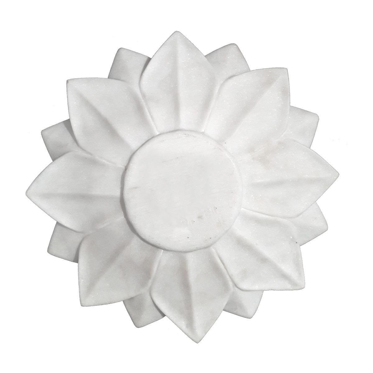 A decorative plate or dish in the shape of a Lotus flower, hand carved in smooth white marble. From India, late 20th century. The perfect accent for any room where a touch of natural elegance is required.