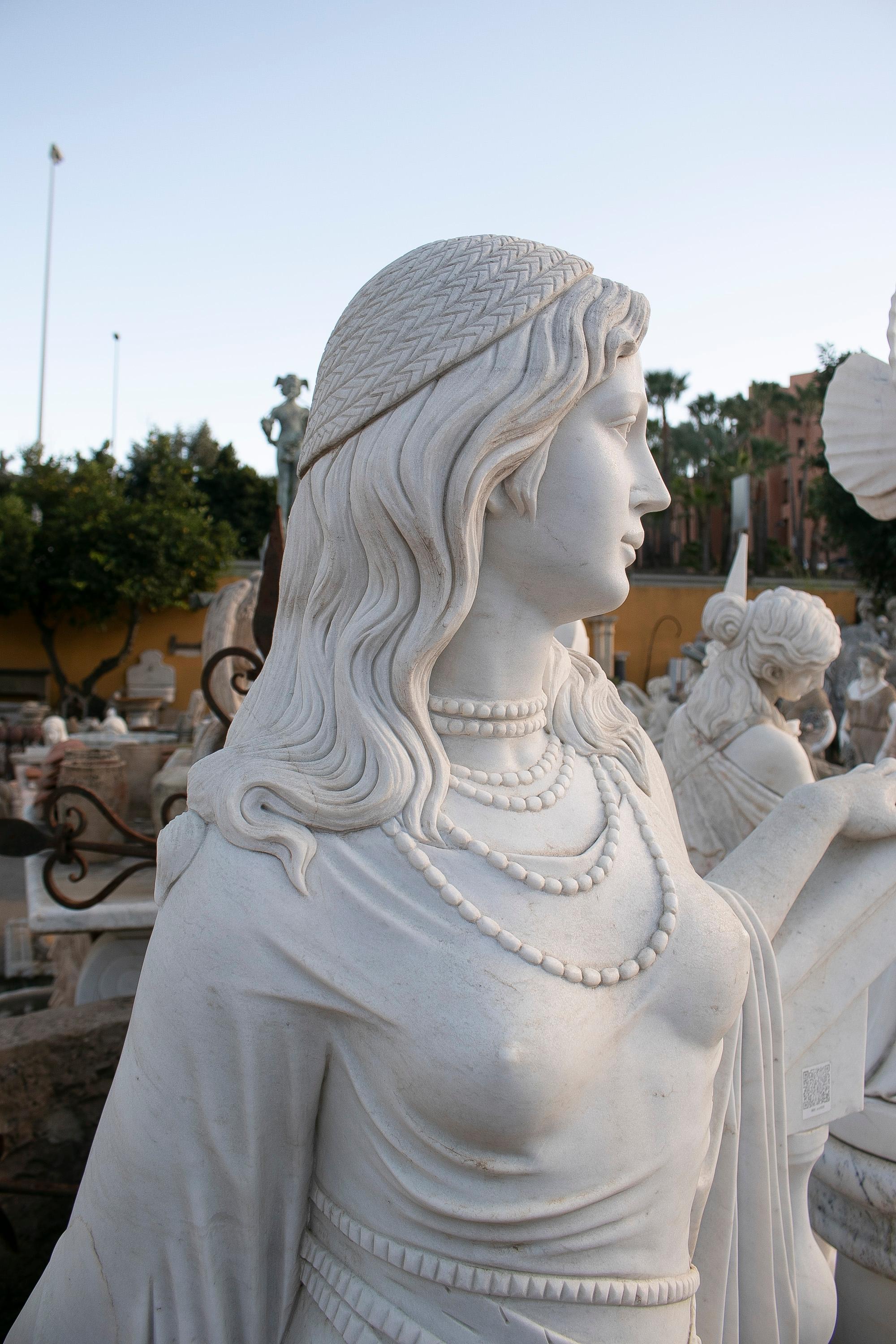 Hand Carved White Marble Sculpture of a Woman Leaning on a Ladder For