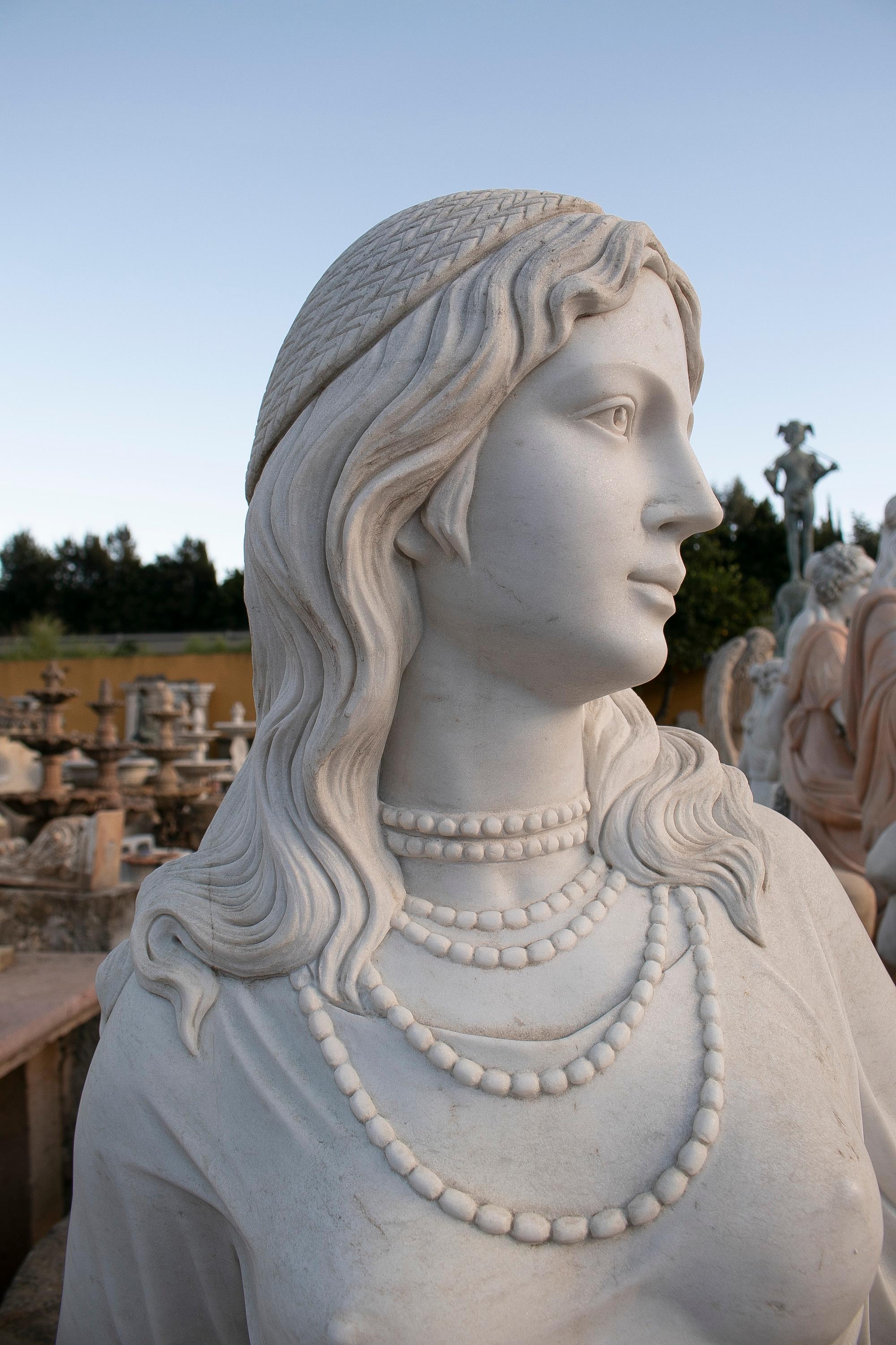 Hand Carved White Marble Sculpture of a Woman Leaning on a Ladder For