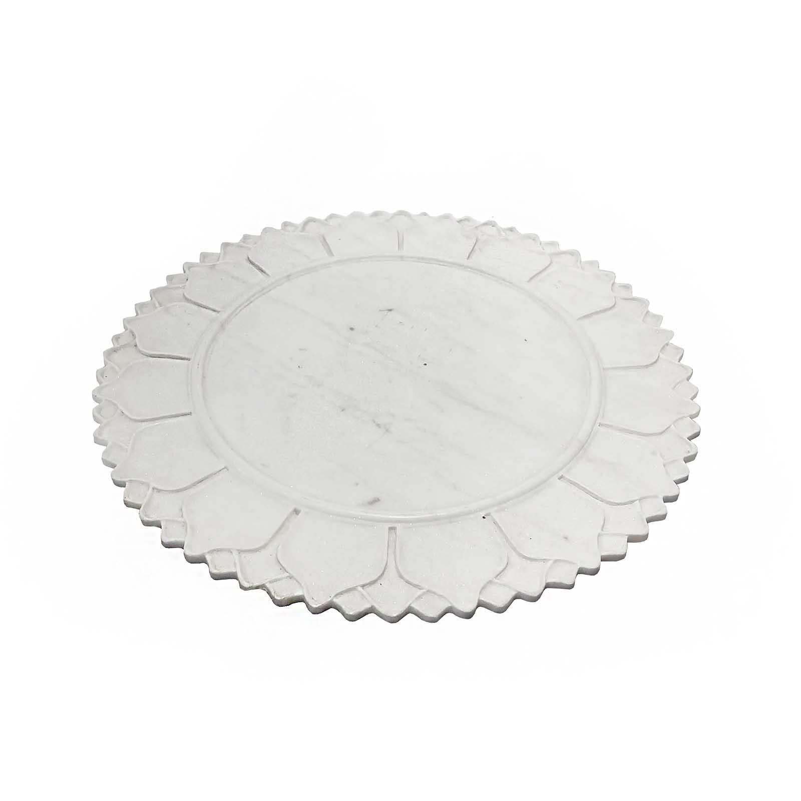 A superb marble charger / server / tray, hand-carved in India, late 1970s. 

Very well preserved. No signs of use, no losses or cracks. Smooth, low-veined white marble, polished and smoothed for a beautiful shiny appearance. 24 inches in diameter,