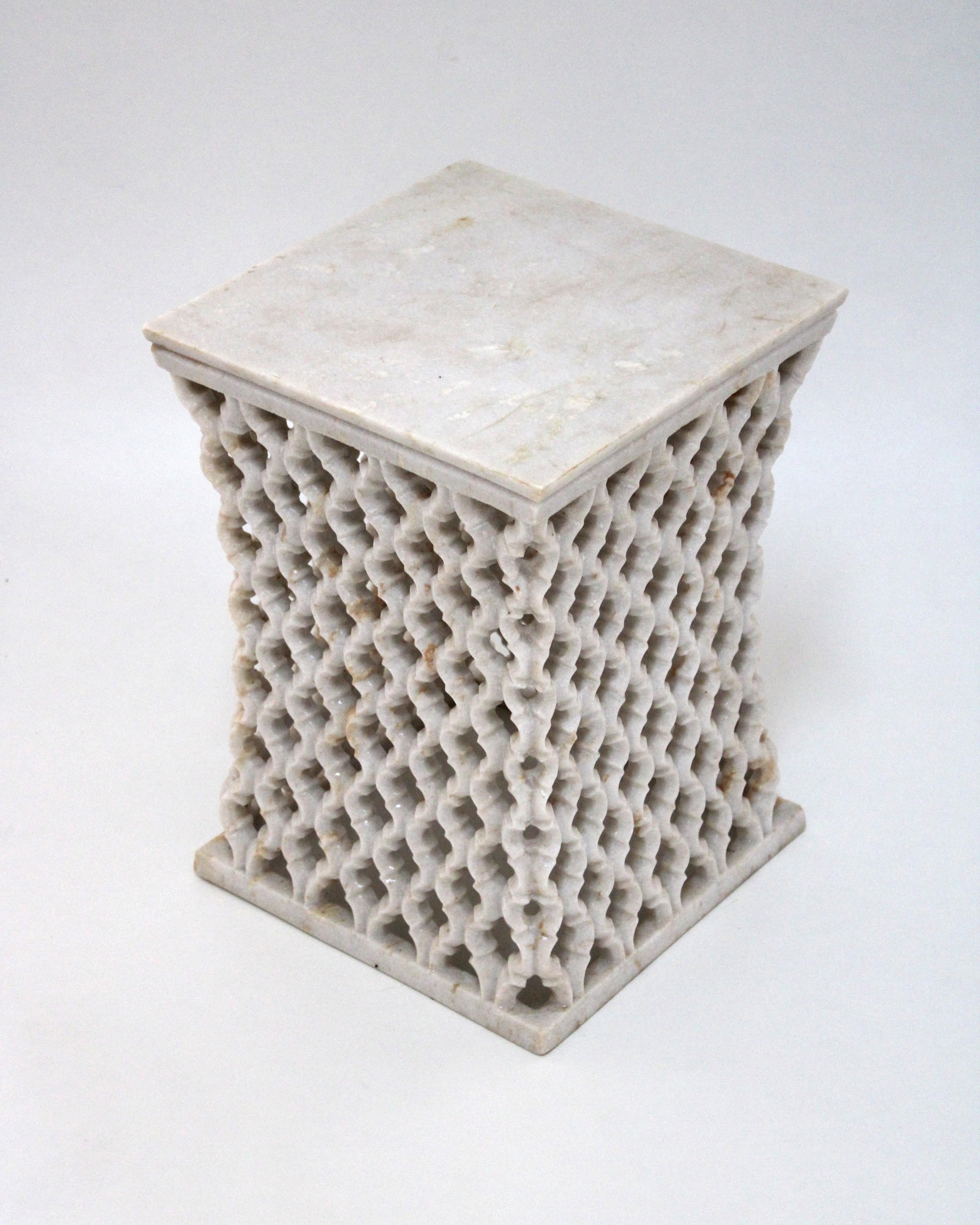 Modern marble side table or bedside tables by Paul Mathieu for Stephanie Odegard are inspired by the elegant pierced marble “Jali” screens and windows he saw in the palaces of Mughal India. These bedside tables or this marble side table is a true