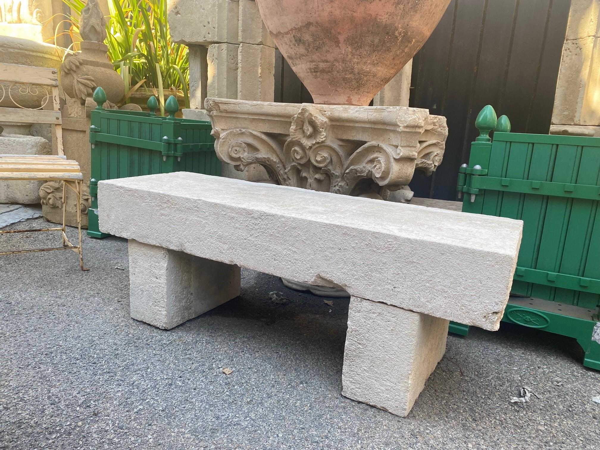 19th Century hand carved white garden thick stone bench. This beautiful Seat is garden bench with simple lines that works in an interior as a seat or decorative architectural sculpted element. Mounted against a wall in a modern context with