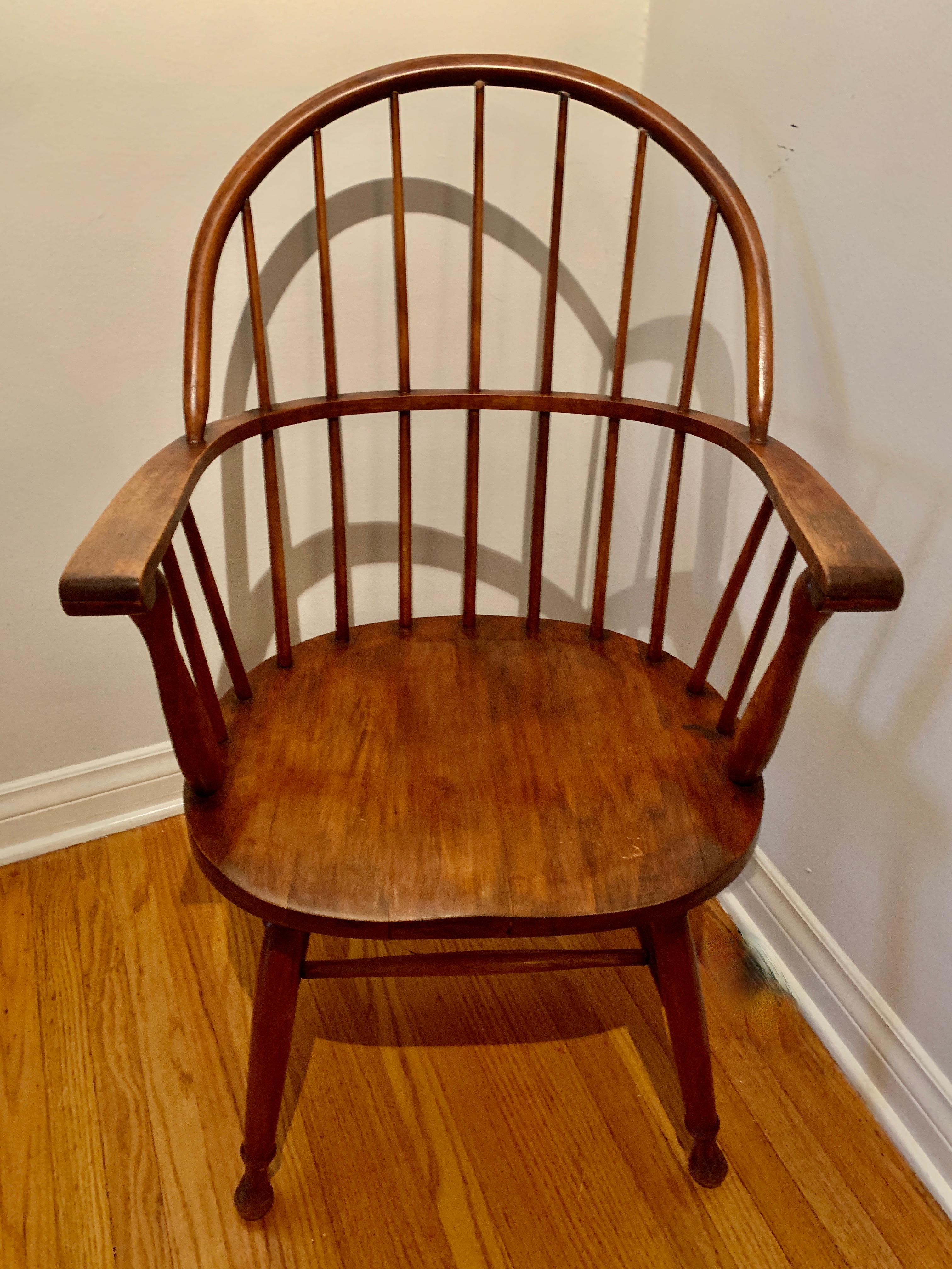 A wonderful example of Windsor Chair. The hand made quality shows and for the age, the piece is in great condition. Because the style of this particular Windsor has no frilly detailing, it works well in many spaces... from contemporary to