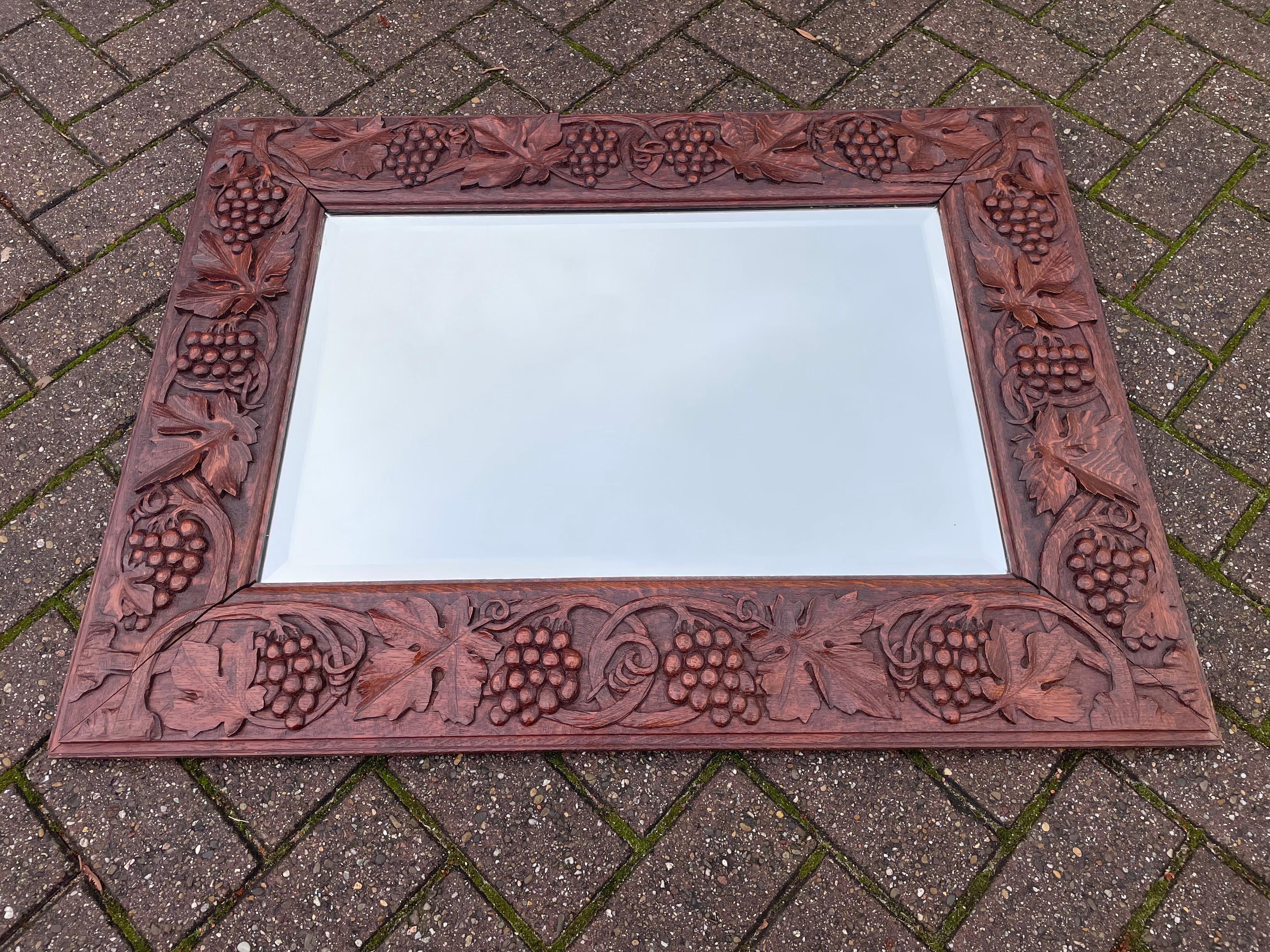 Antique, exceptional and unique wall mirror.

Via one of our foreign contacts we recently purchased this perfectly realistic grapevine wall mirror. The stunning and unique mirror frame is all handcarved out of solid tiger oak. Not only does it come