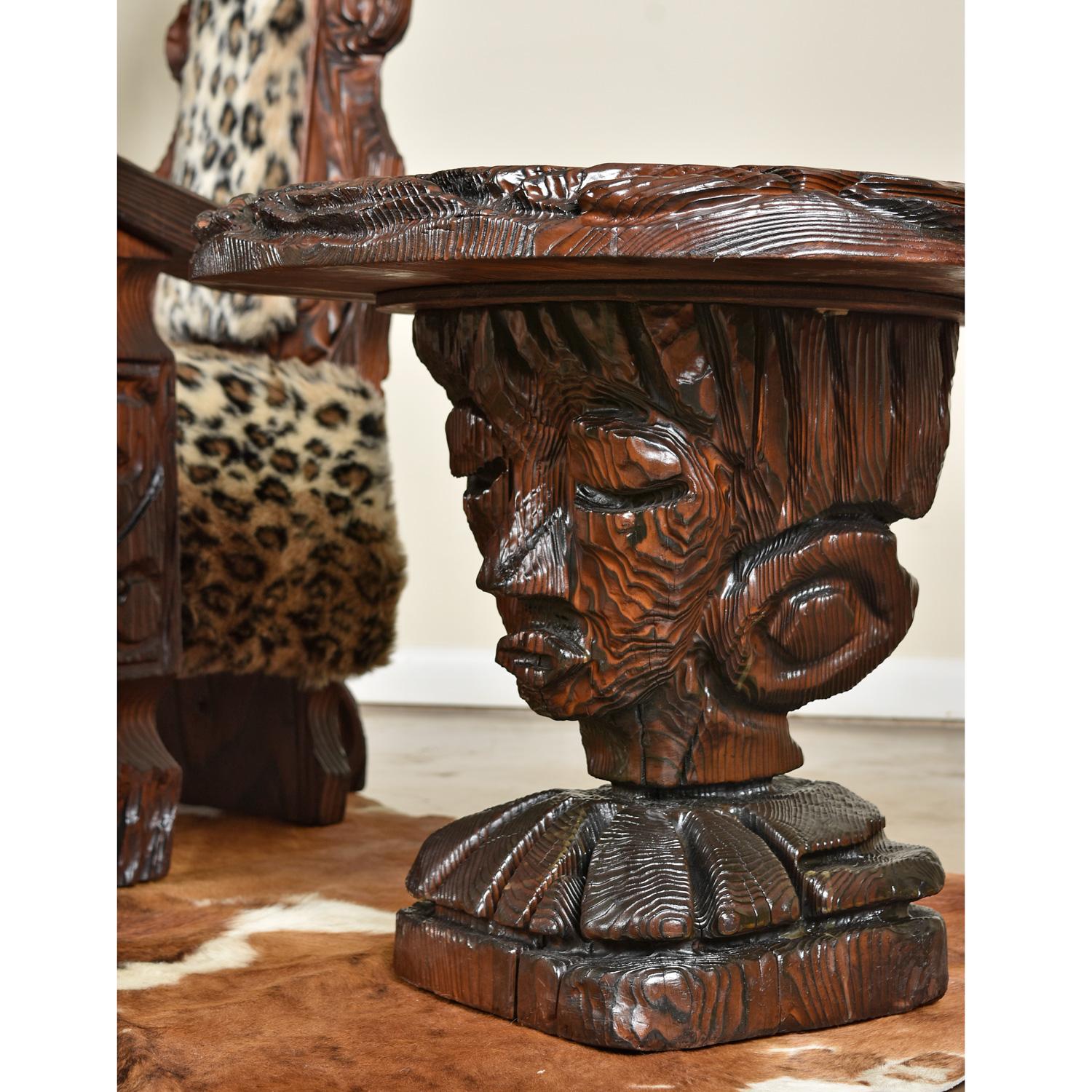 This charming figurative feminine sculpture is also a very practical Polynesian style cocktail table.  The head dress of this island beauty doubles as a tabletop.  Vintage 1960s, carved from solid cypress wood. If you’re into Tiki, then you probably