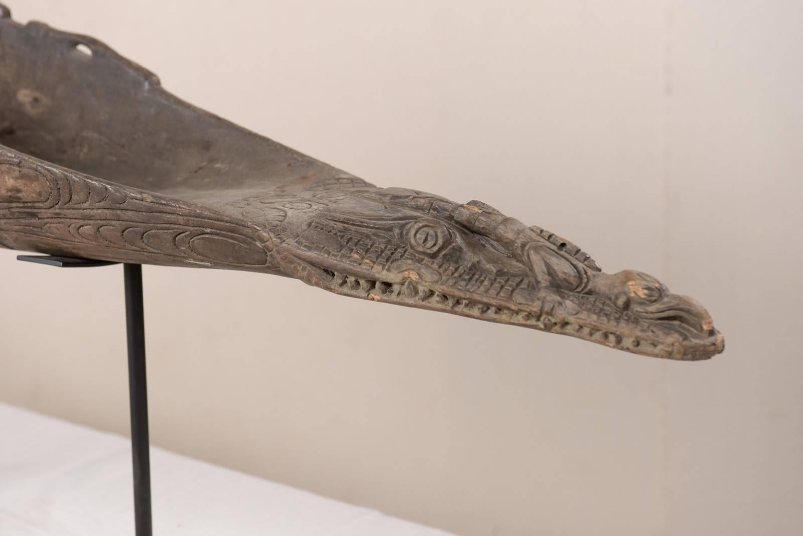Hand-Carved Wood Boat Prow on Iron Stand from Papua New Guinea, Mid-20th Century In Good Condition In Atlanta, GA