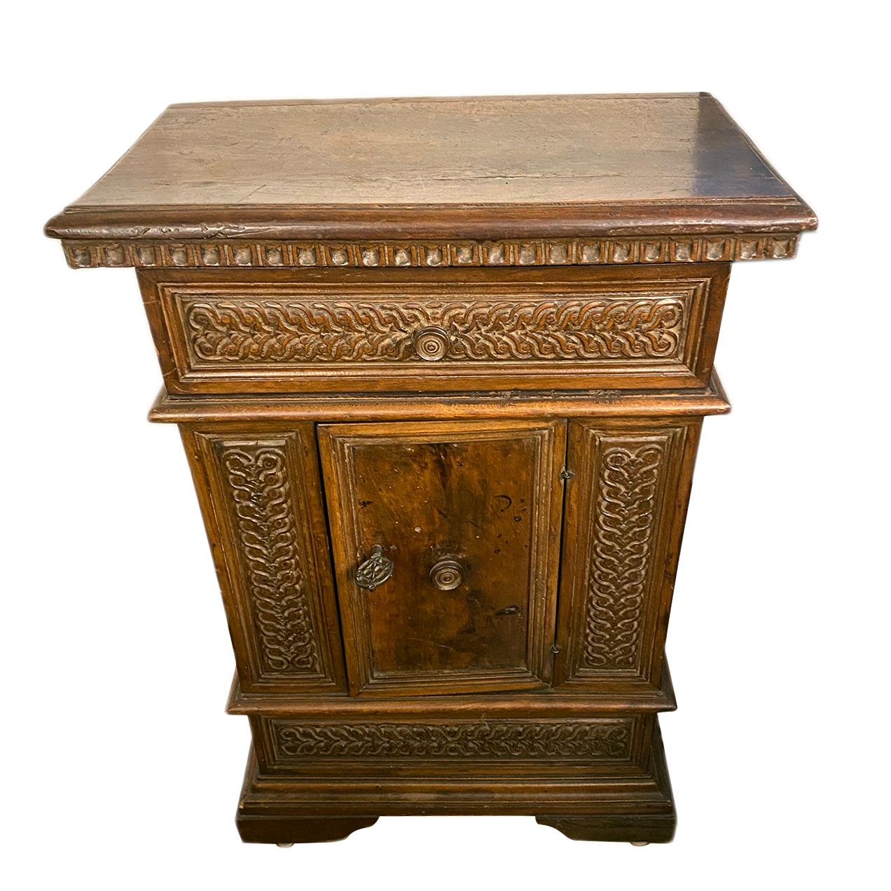 An Italian late 19th century hand carved wood cabinet.

Measurements:
Height 31.5