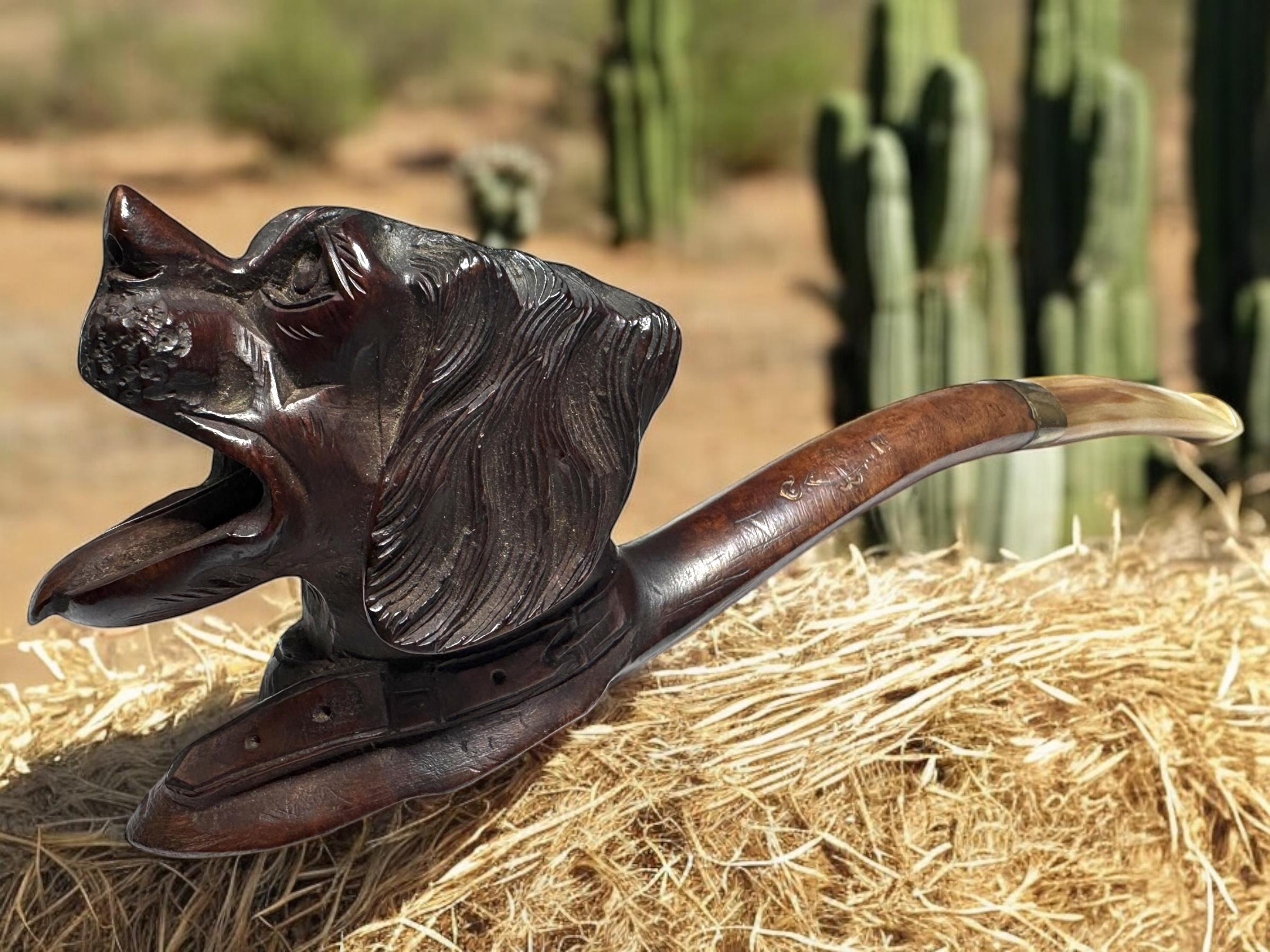 An antique Estate pipe hand carved wood Dog head pipe. Good used condition. Some minor surface wear. See pictures for details. An all original item to display in your man cave. super nice patina.