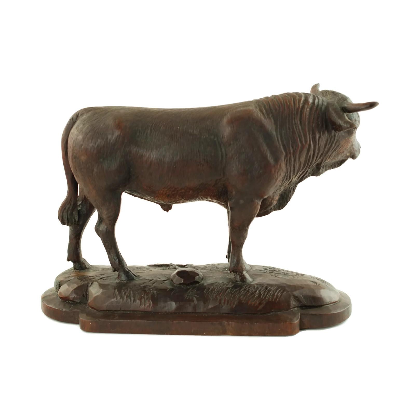 wooden bull statue