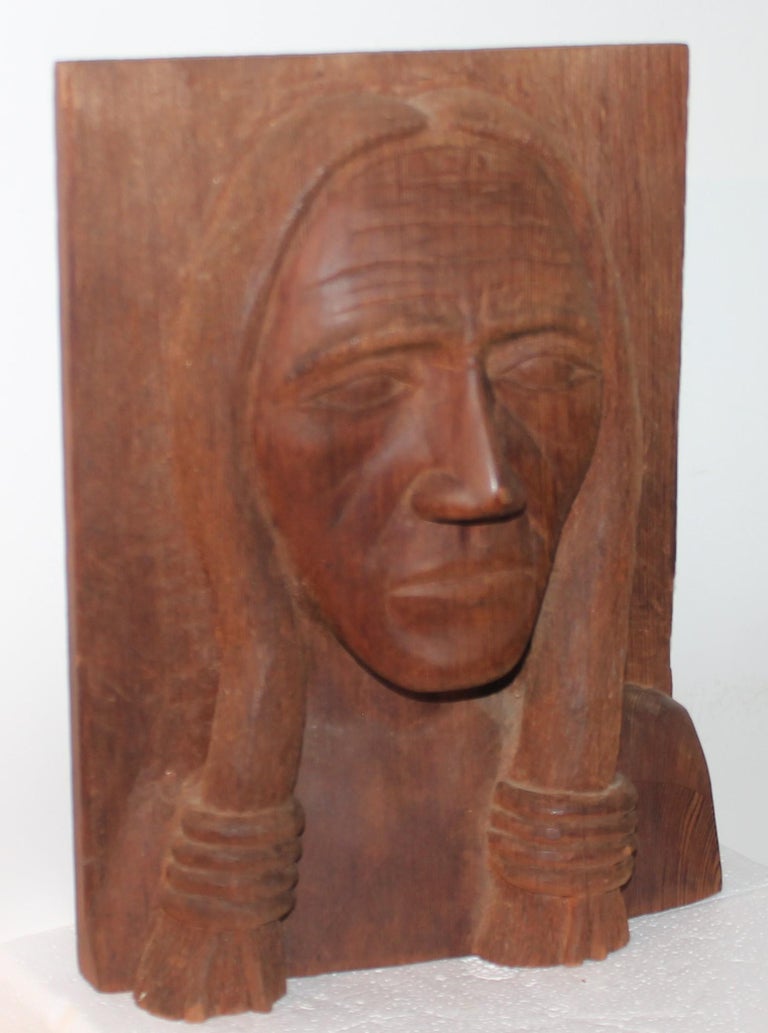 Early 20thc hand carved wooden Indian chiefs plaque. This is so amazing and three dimensional at the same time.