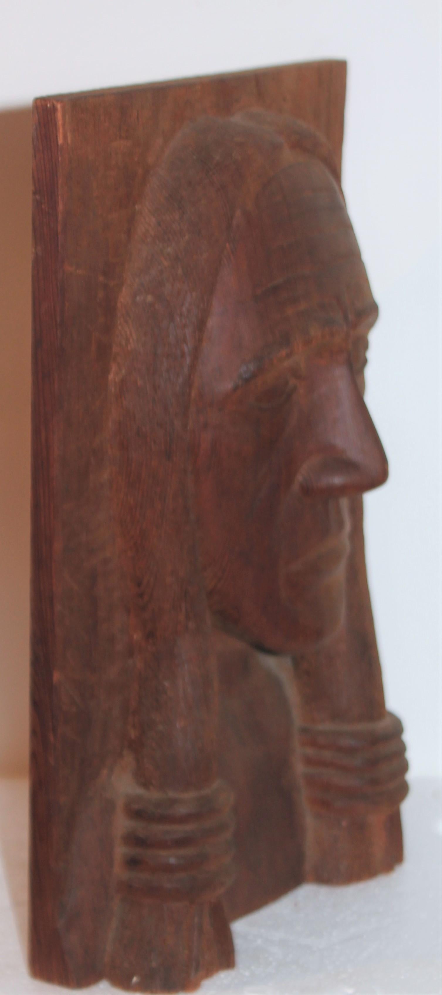 wooden indian head carving