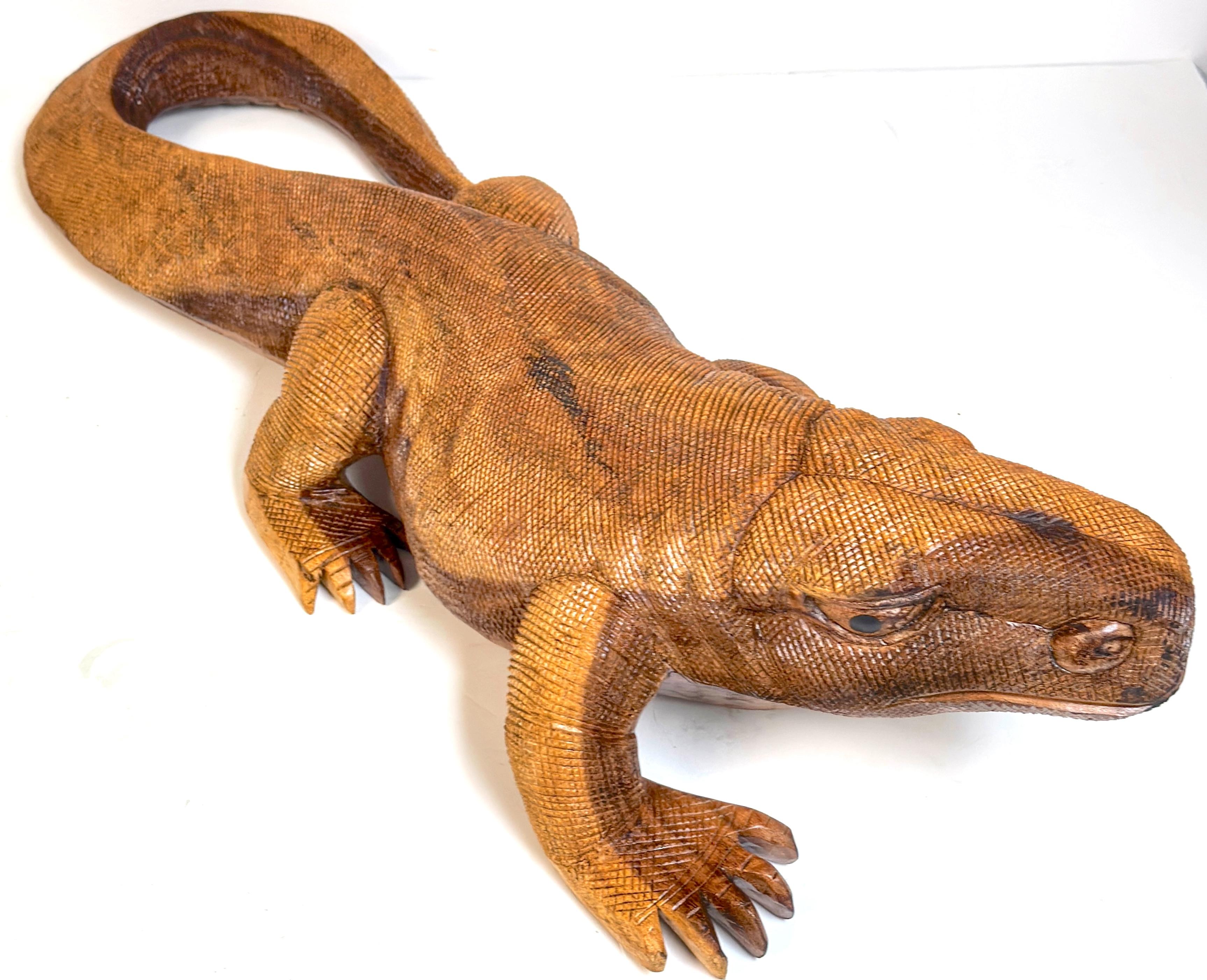 Hand-Carved Wood Life-Size Monitor Lizard, School of Bustamonte, Mexico, 1970s Mexico, circa 1970s

An impressively scaled hand-carved wooden monitor lizard sculpture, rendered with dynamic presence and exceptional surface detail. Measuring 41