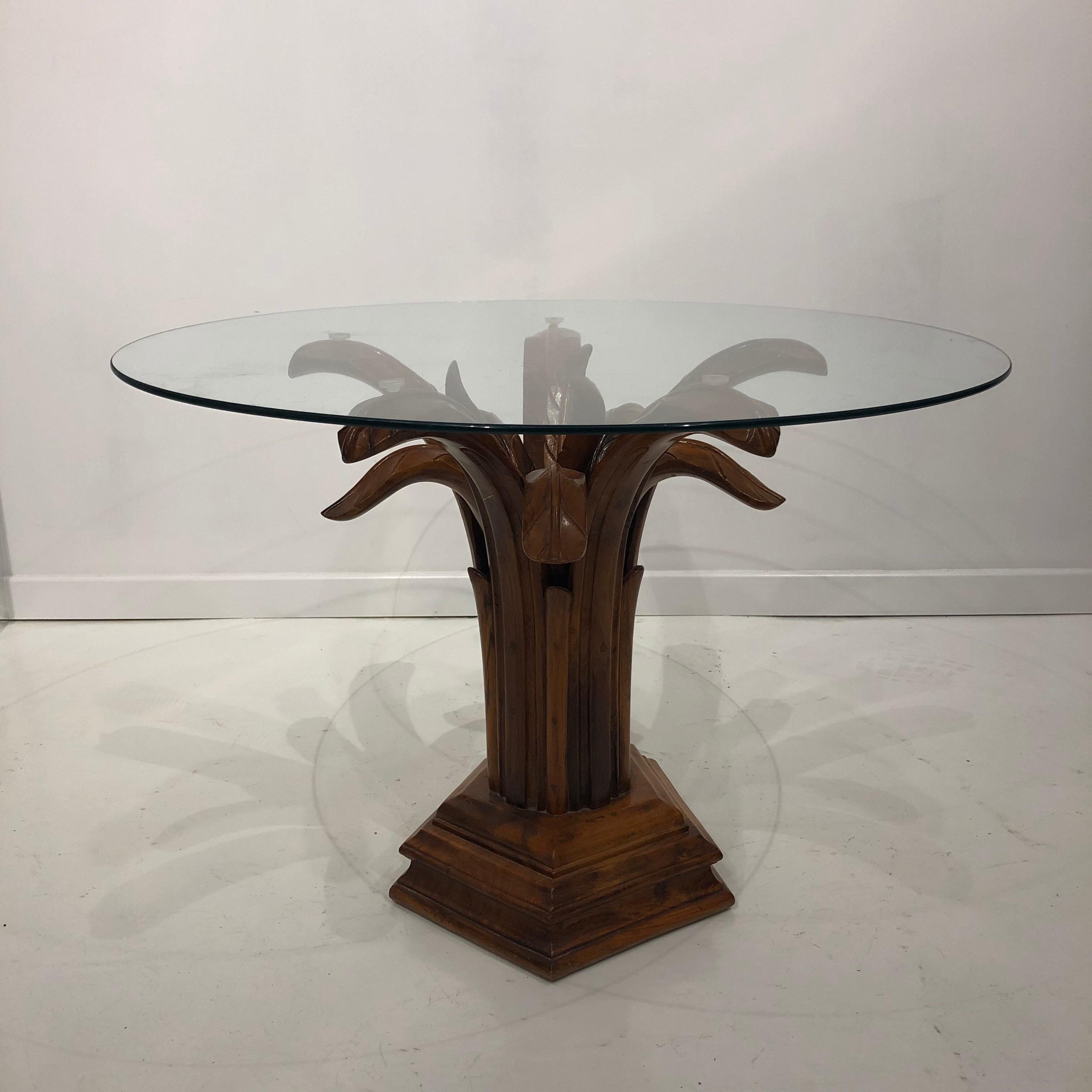 A beautiful midcentury side table in the form of palm tree with a round glass top.
The wood is hand carved skilfully and varnished to give a nice finish.
For accurate international quote please contact up. We can ship without the glass top as that