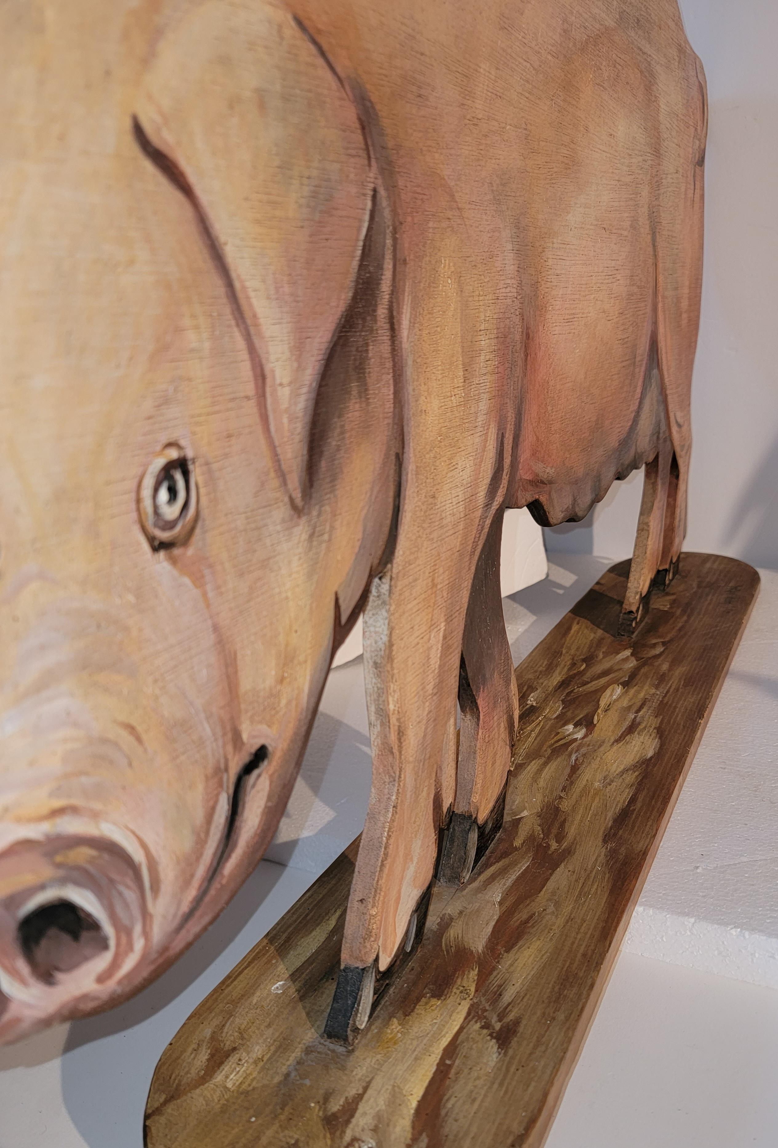 carved wooden pig