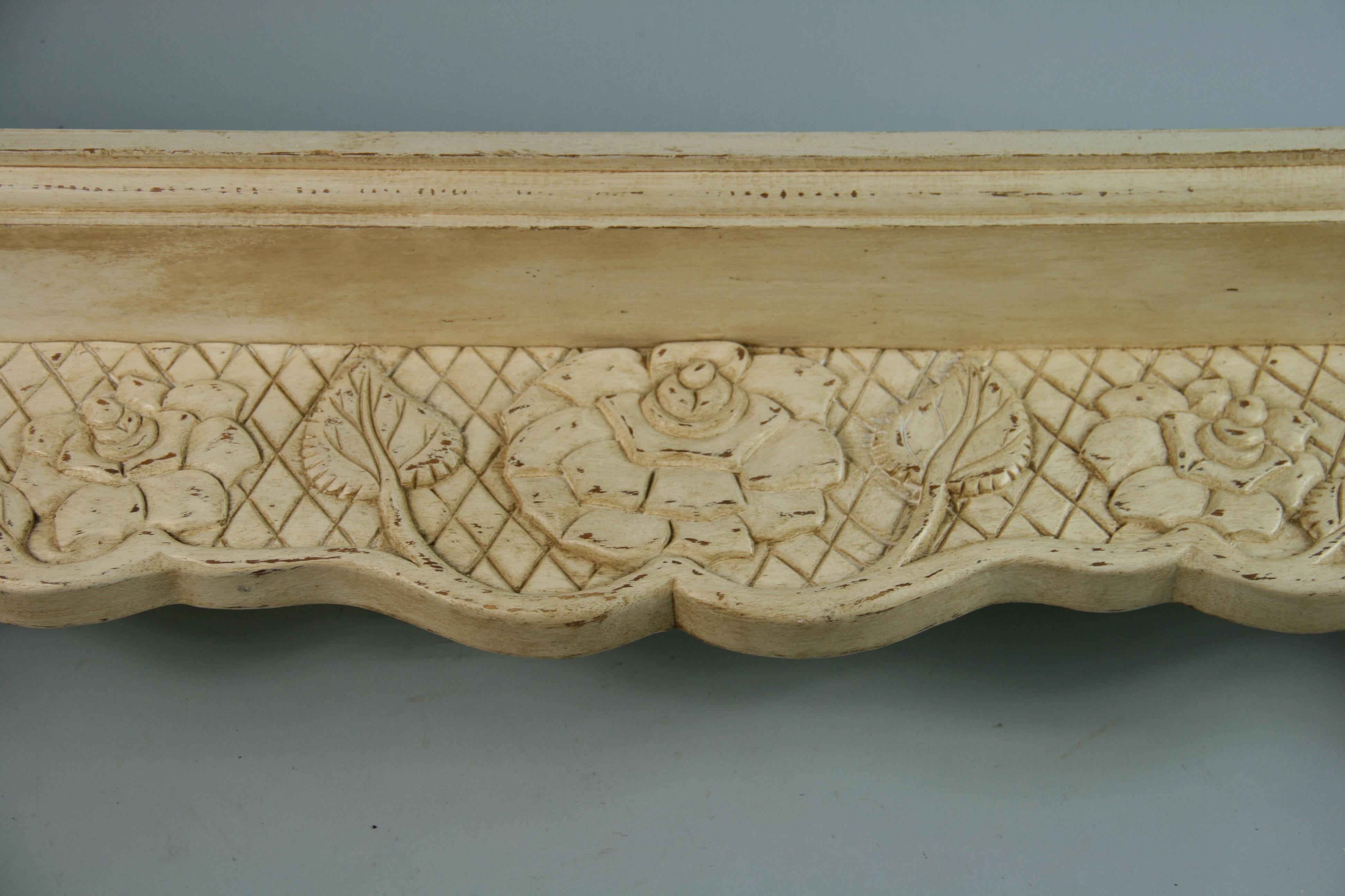 carved wooden shelf