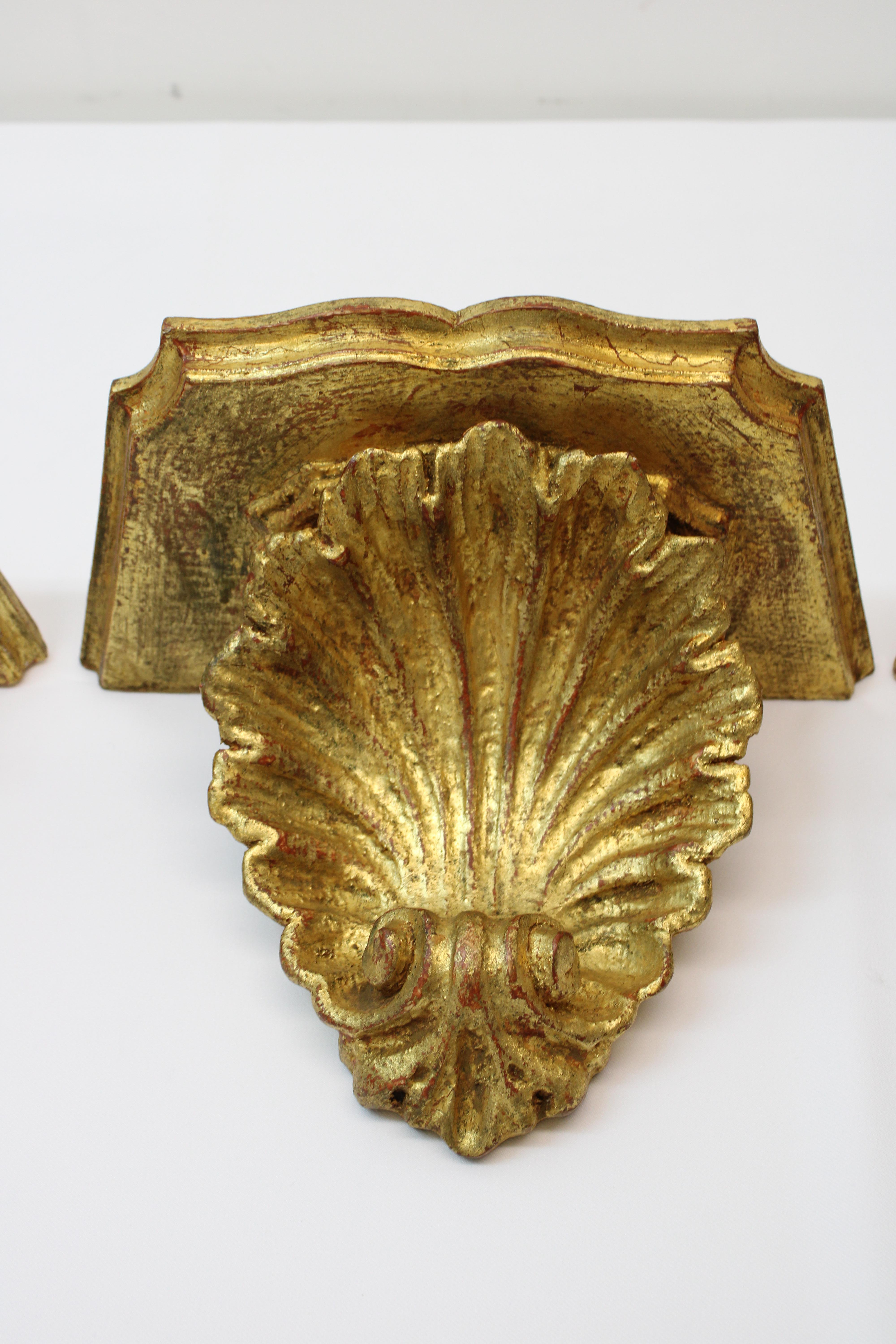 C. 19th century group of 3 gilded hand carved wood shell wall shelves
These beauties were done in the 1930's & will accent any item you have on top of them.