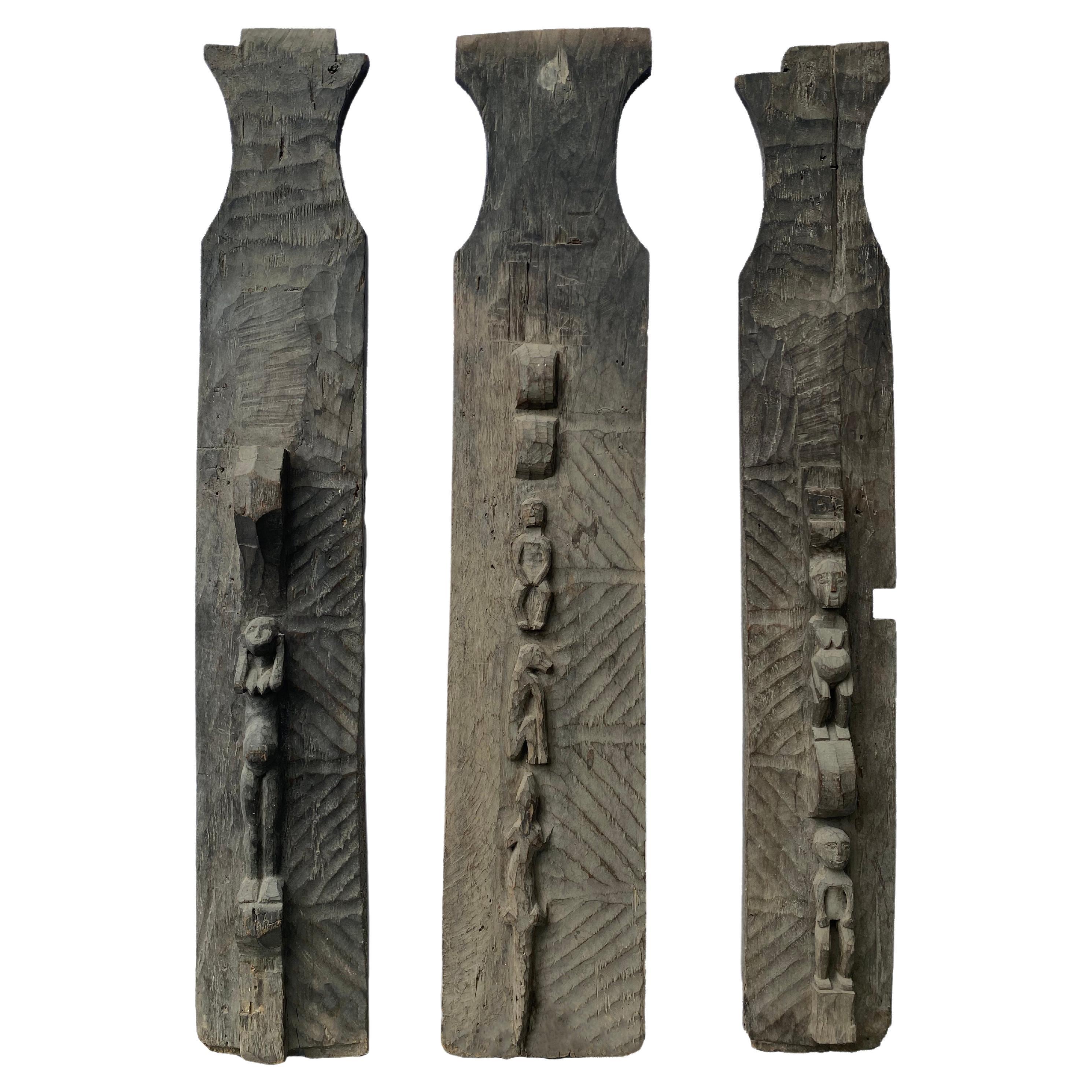 Handgeschnitztes Timorese-Set aus Holz mit Stammesmotiven aus Holz, Indonesien, frühesisches 20. Jahrhundert