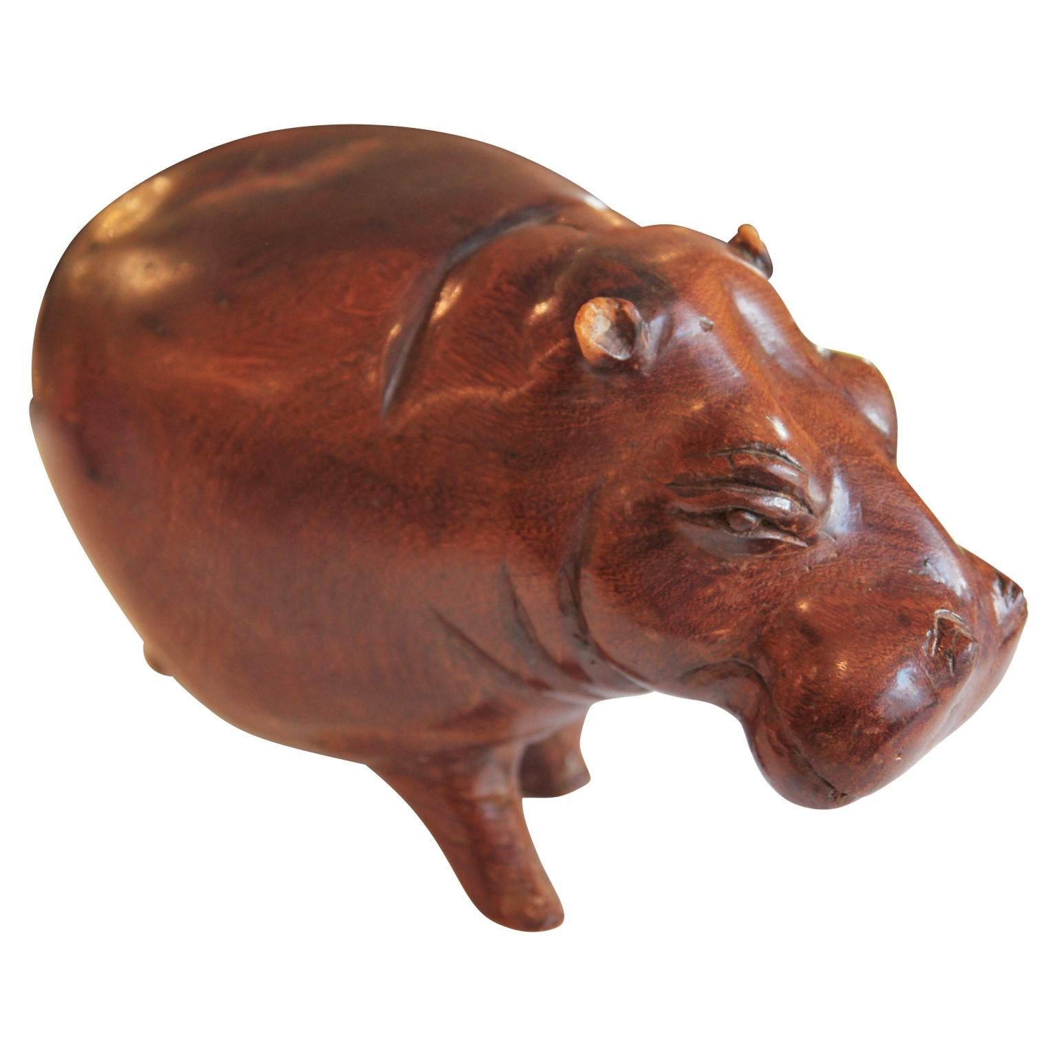 wooden hippo sculpture