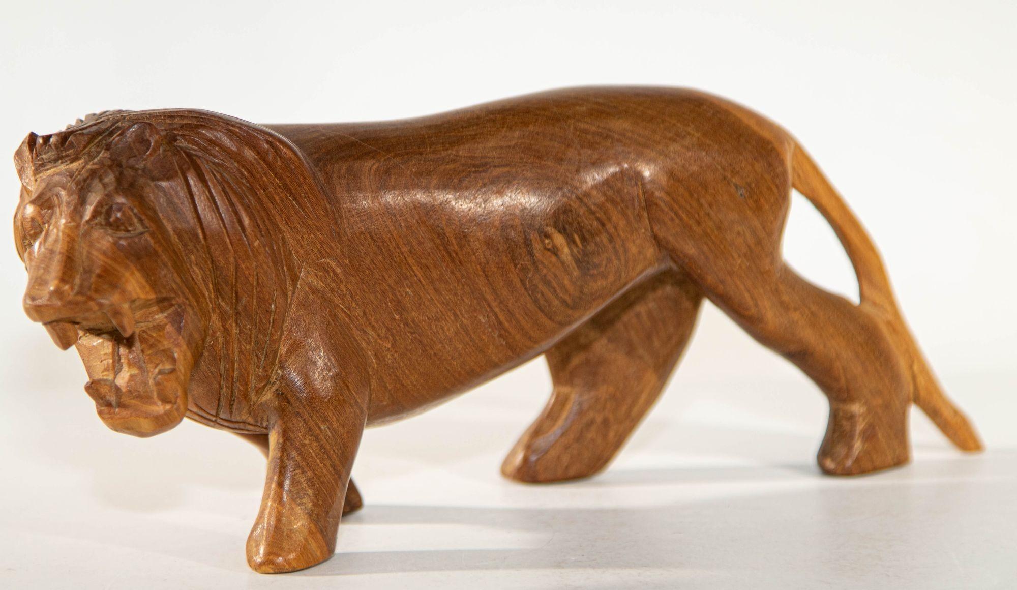 Vintage hand carved wooden lion sculpture, hand carved statue, wood carving, African animal figurine, safari, Kenya African Decor Safari Animal Figure. handcrafted exotic home decor, ornament.
handcrafted Lion statue, prowling Lion Figurine African