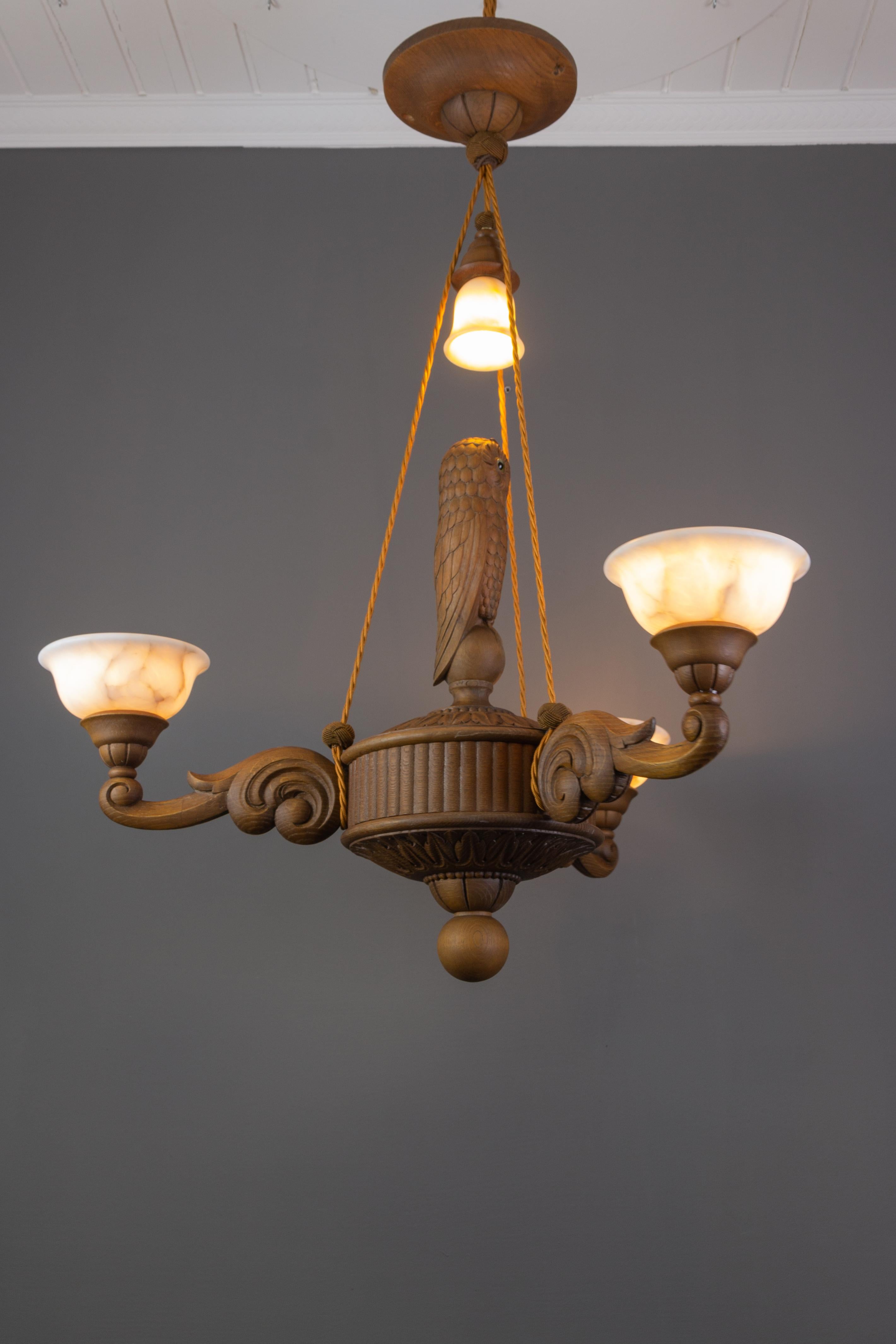 Hand Carved Wooden and Alabaster Four-Light Chandelier with Owl Figure, Germany In Good Condition In Barntrup, DE