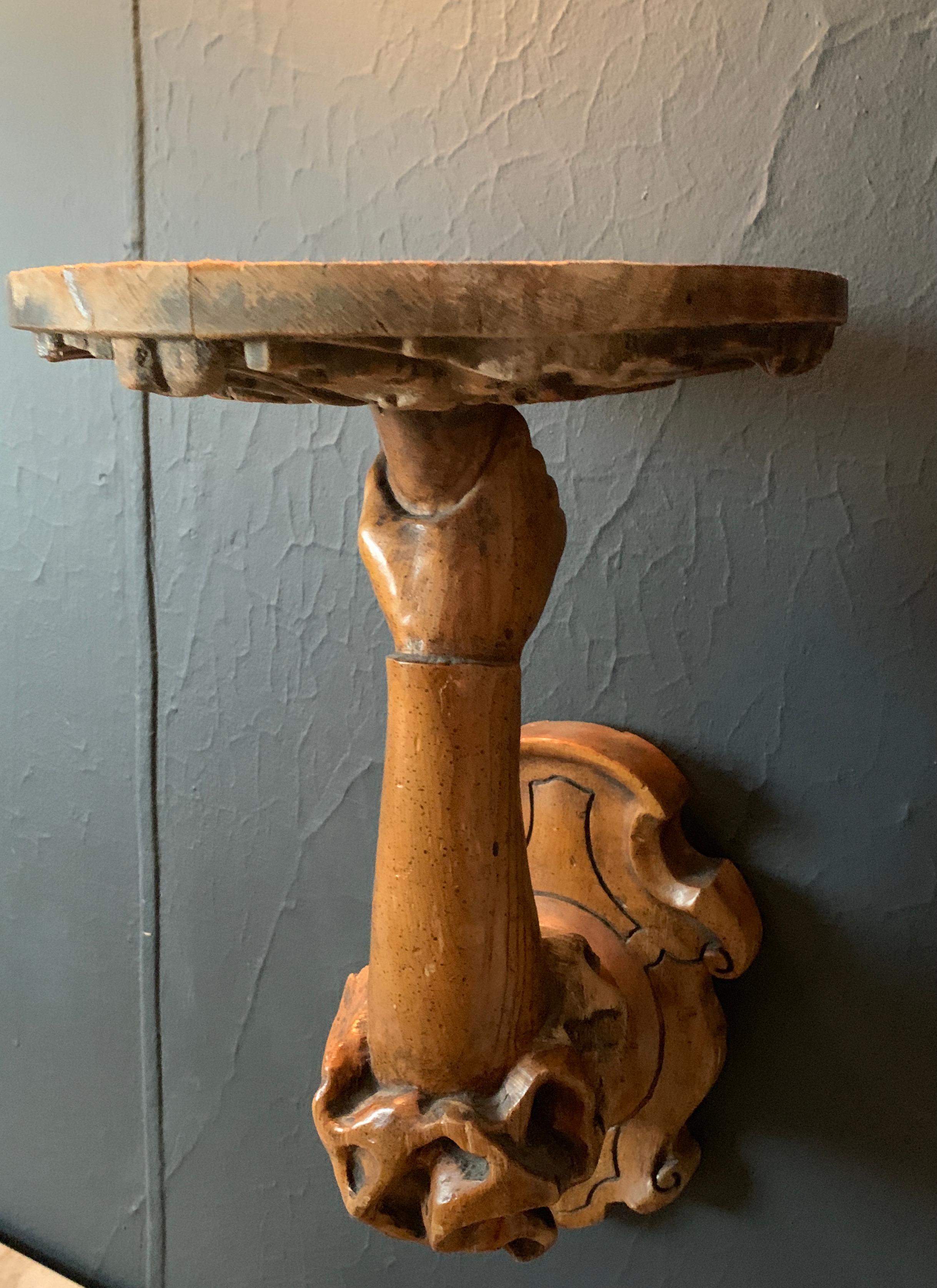 Patinated Hand Carved Wooden Bracket of a Hand Holding Shelf
