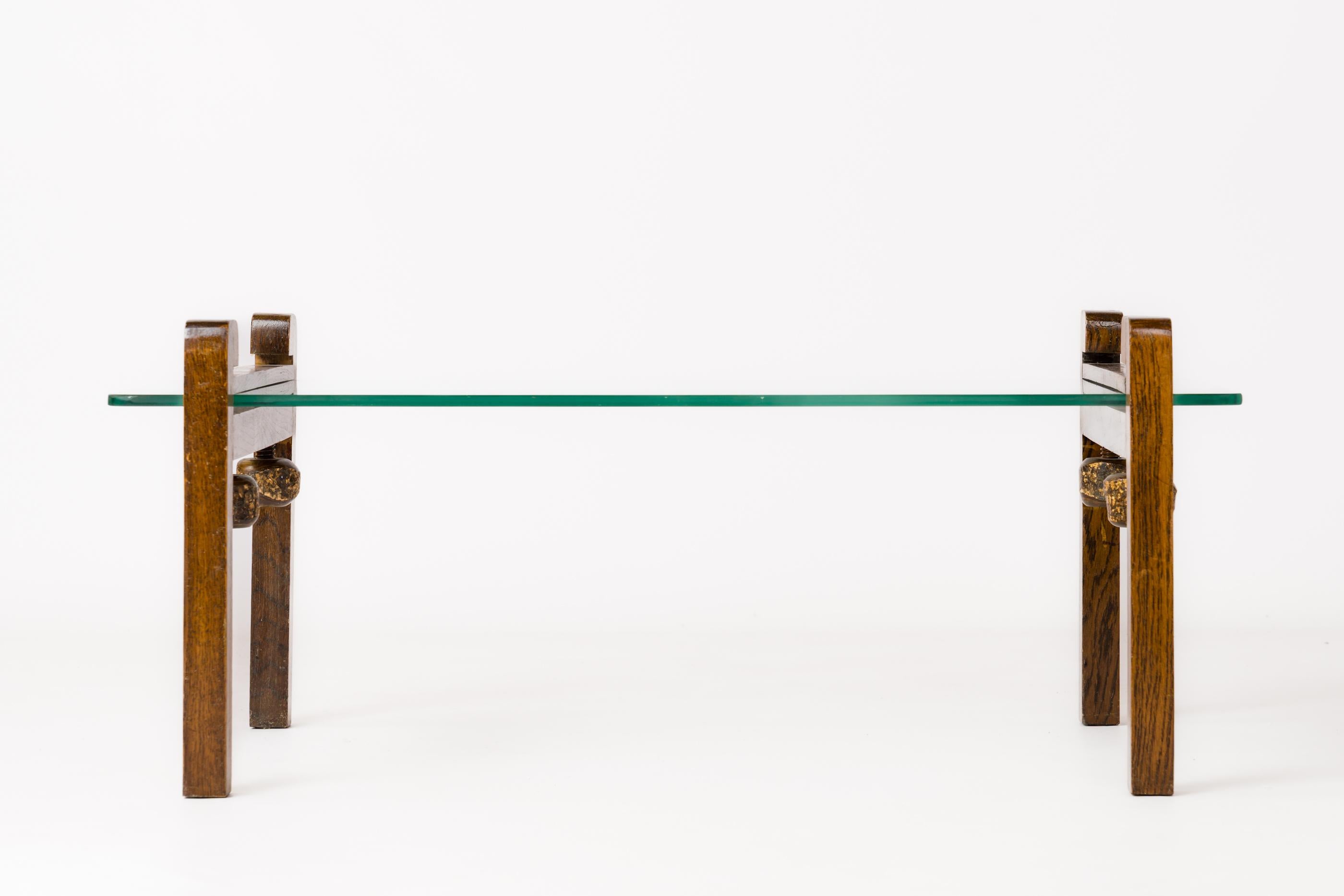 French Hand-Carved Wooden Clamp and Glass Coffee Table - France 1970's For Sale