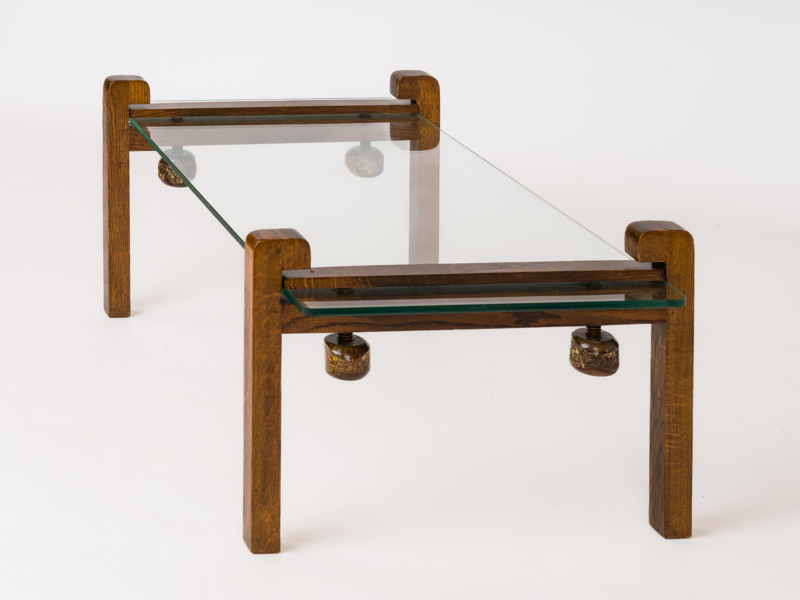 Hand-Carved Wooden Clamp and Glass Coffee Table - France 1970's In Good Condition For Sale In New York, NY