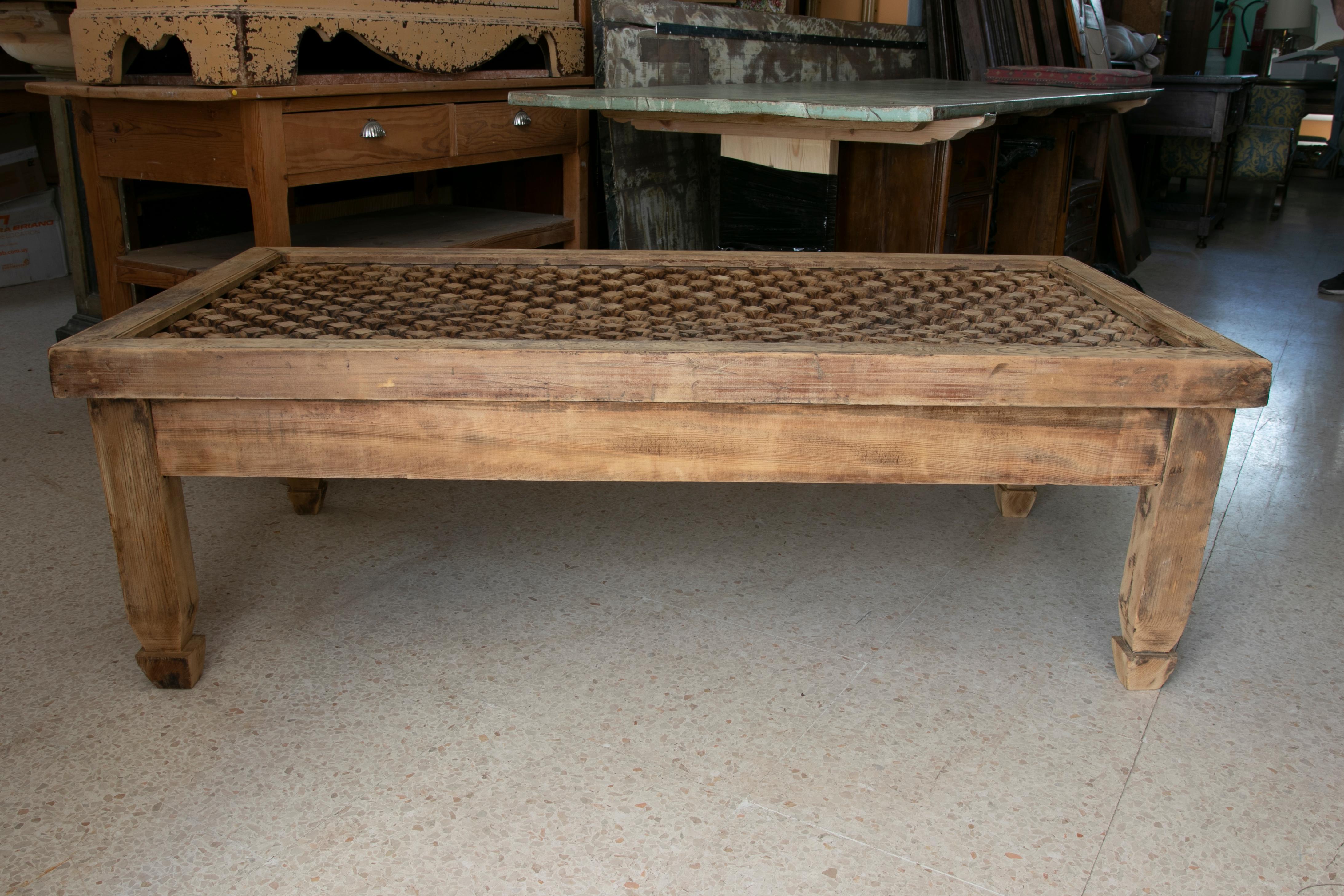 Hand-Carvedwooden coffee table with Lattice on Top.