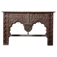 Hand-Carved Wooden Console Table With Ornate Floral Details Hand-Carved Wooden Console Table With Ornate Floral Details