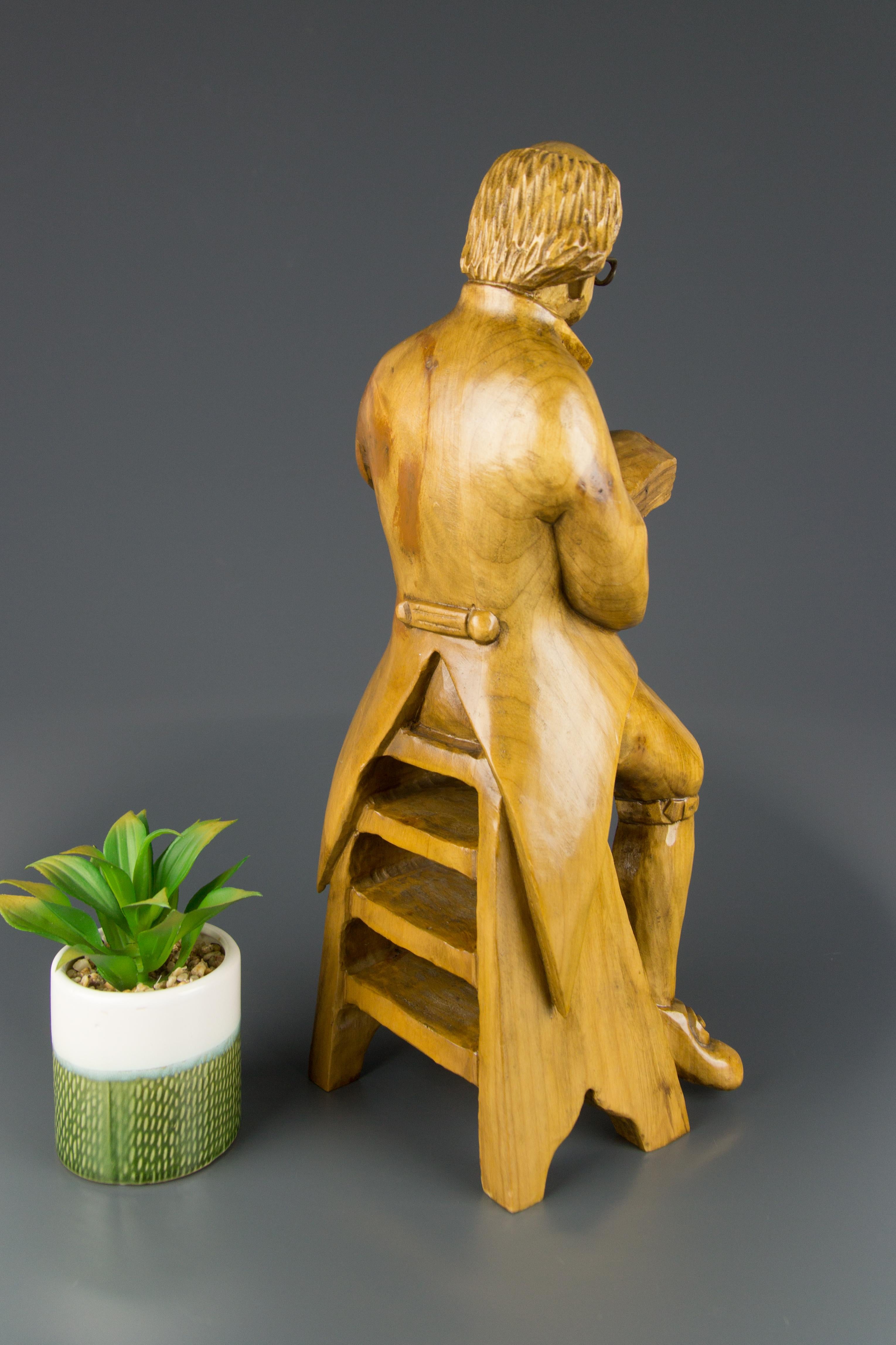 Hand Carved Wooden Figurative Sculpture of a Professor with Books For Sale 2