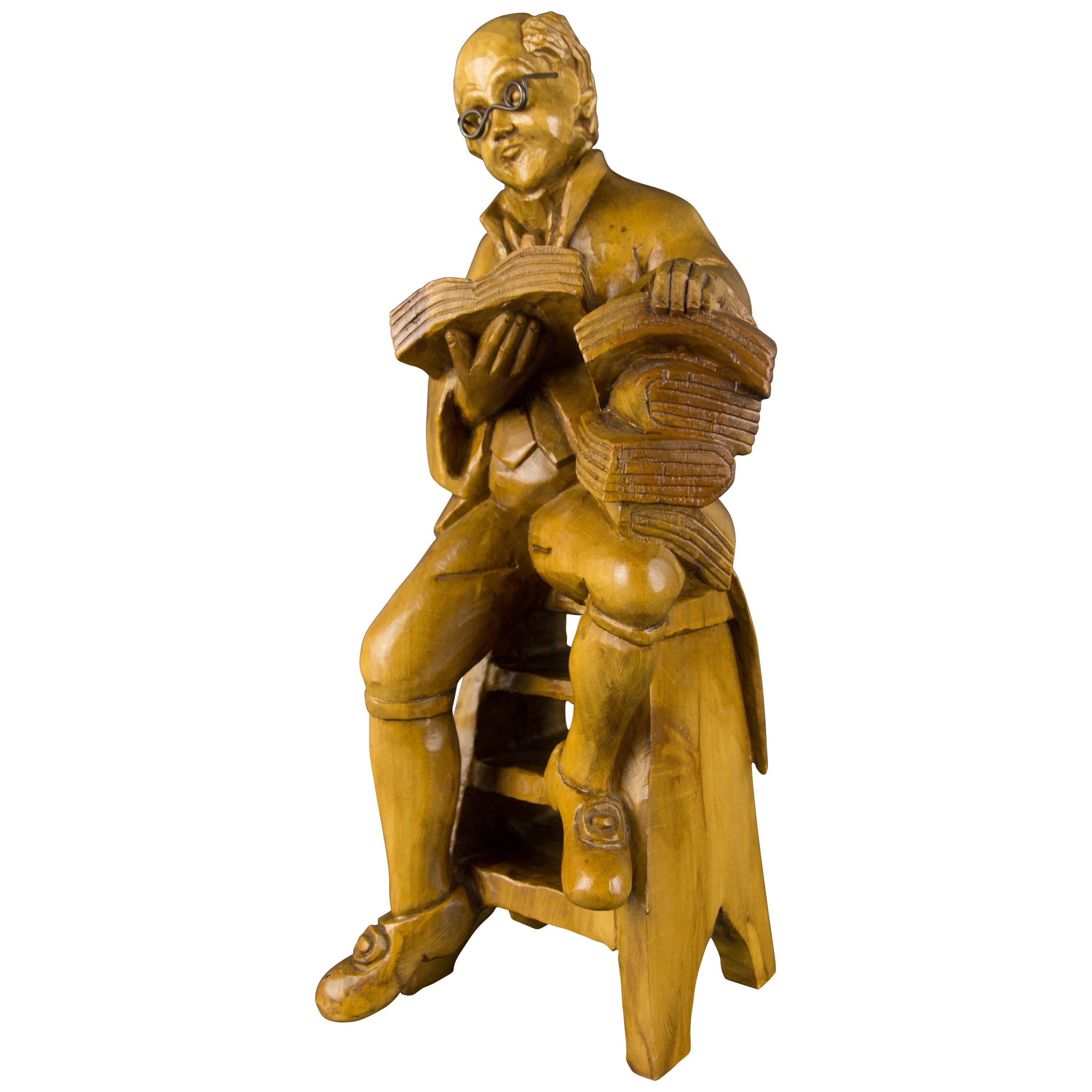 Hand Carved Wooden Figurative Sculpture of a Professor with Books
