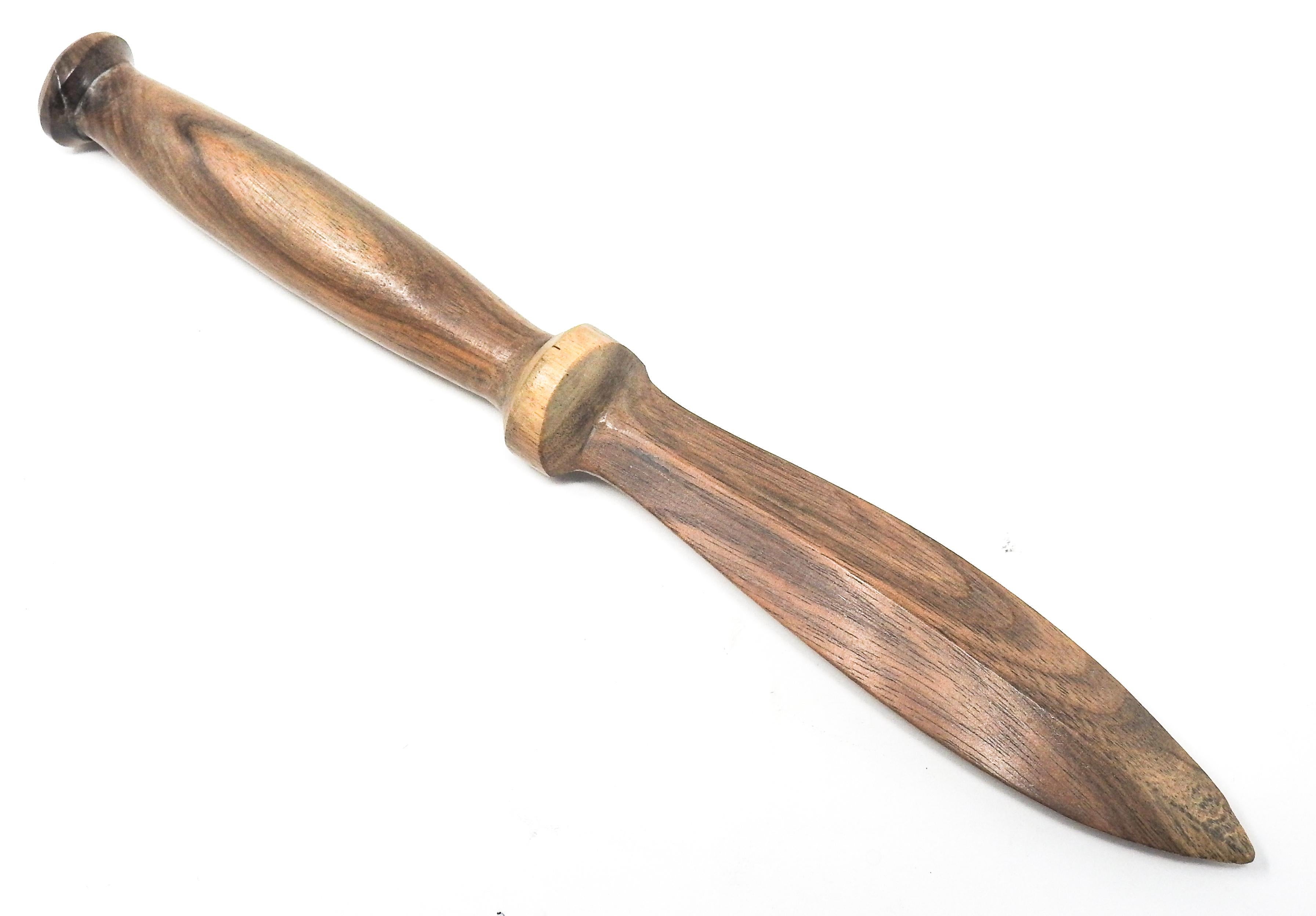 The grains of the wood in this hand carved letter opener are stunning. The person that carved this placed the styling to show off the beauty of the wood.