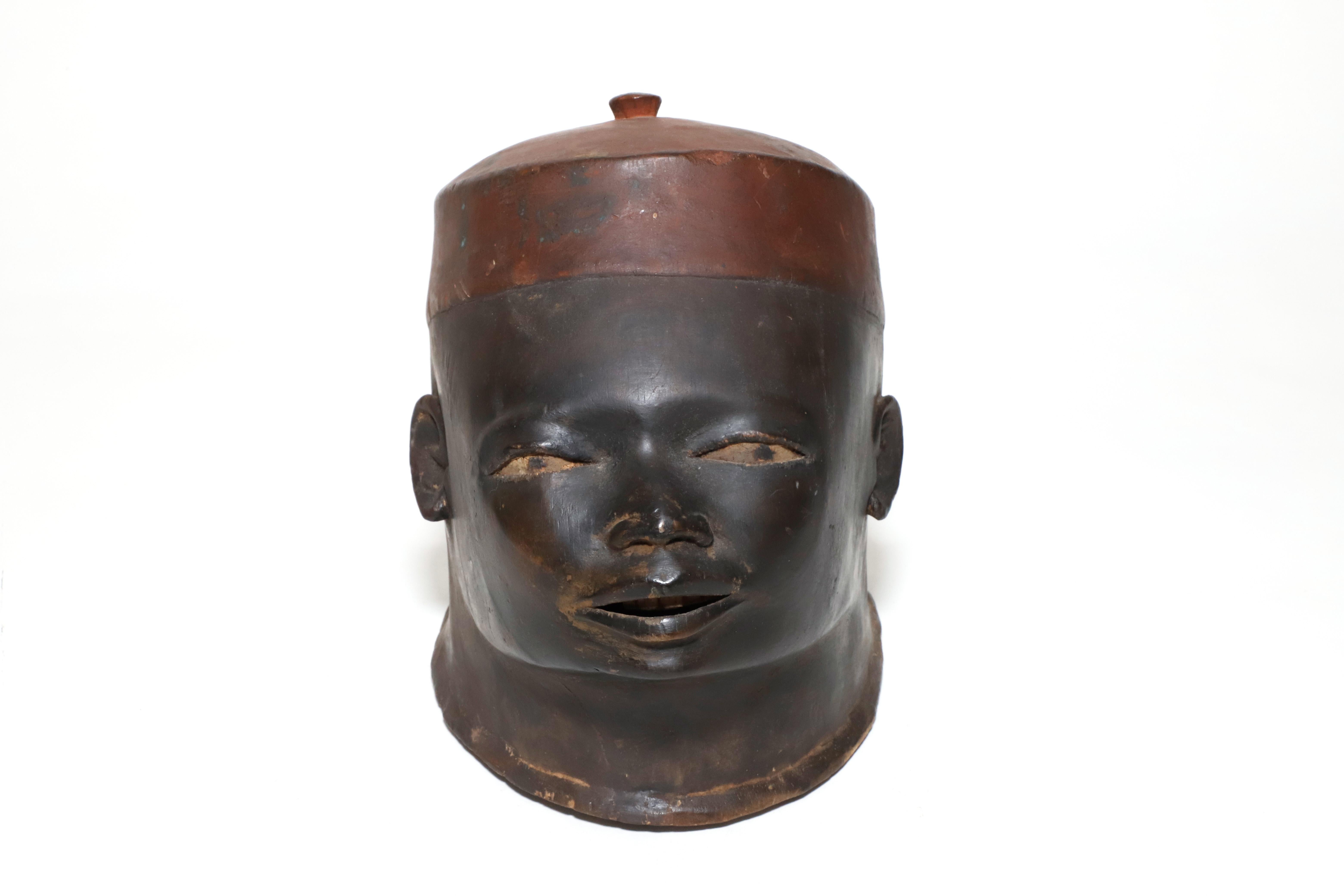 Hand carved wooden Makonde Mask From Mozambique, Tanzania Circa 1950s. Mozambican Makonde masks represent ancestral spirits who temporarily return to earth to appear in dances that celebrate the conclusion of the initiation rituals of adolescent