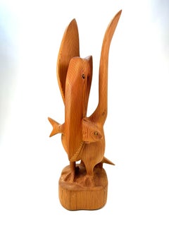 Hand-Carved Wooden Pelican Sculpture with Fish