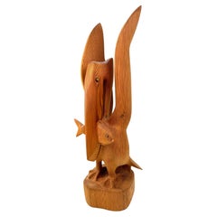 Hand-Carved Wooden Pelican Sculpture with Fish