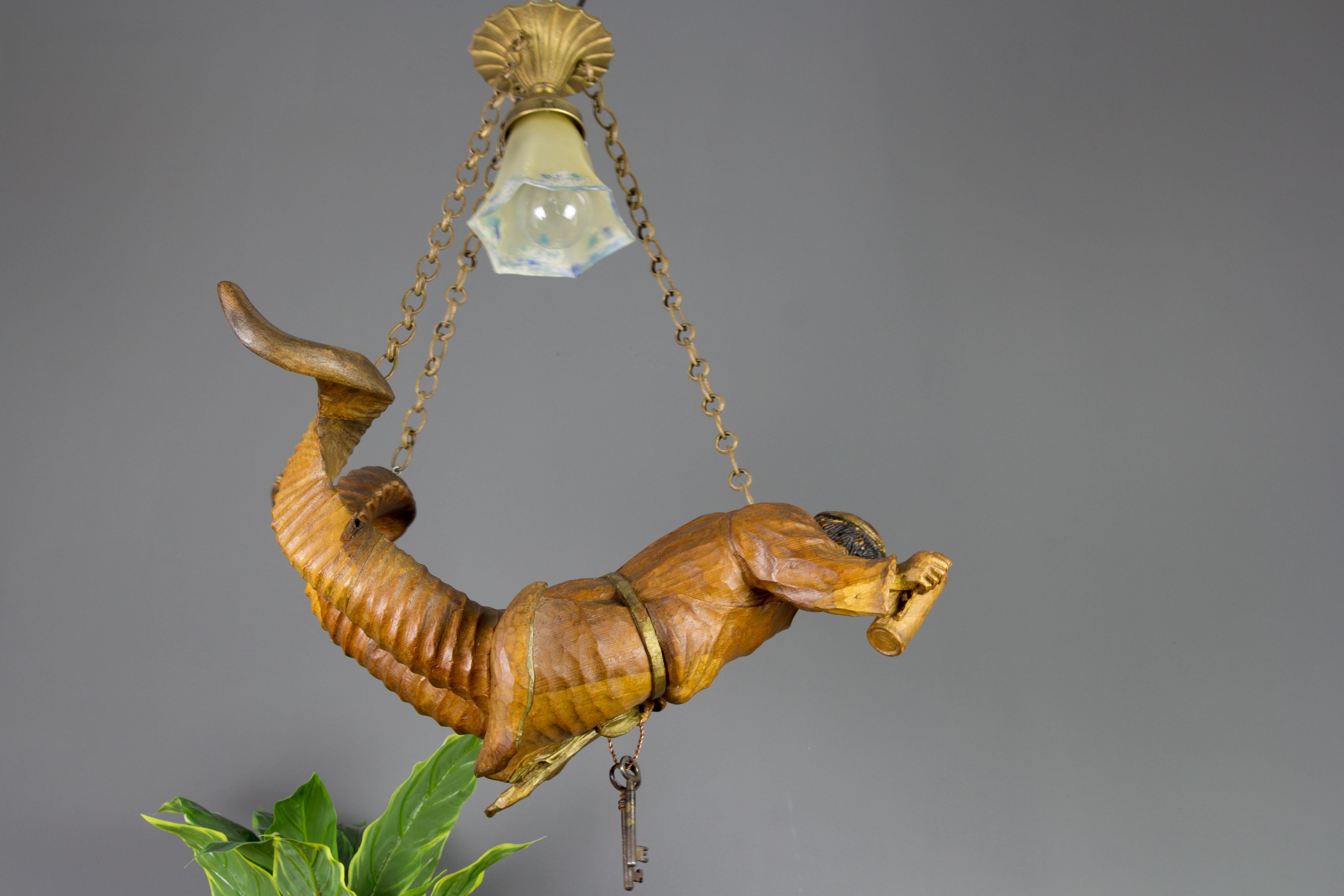 Hand-Carved Hand Carved Wooden Pendant Light Lustermannchen with Cellar Master Figure, 1920s