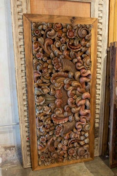 Hand-Carved Wooden Relief with Framed Flower and Leaf Decoration