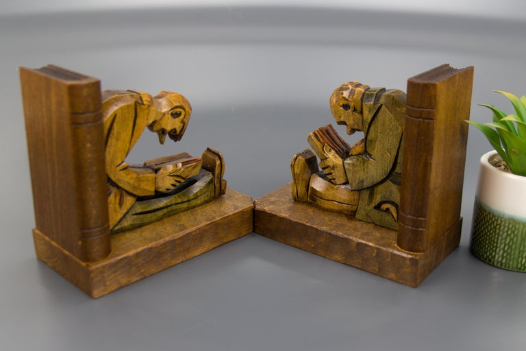 Mid-20th Century Hand Carved Wooden Sculpture Bookends Two Reading Men For Sale