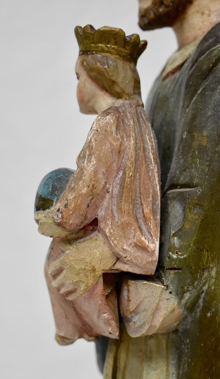 Hand Carved Wooden Sculpture of Saint Joseph with Baby Jesus at 1stDibs