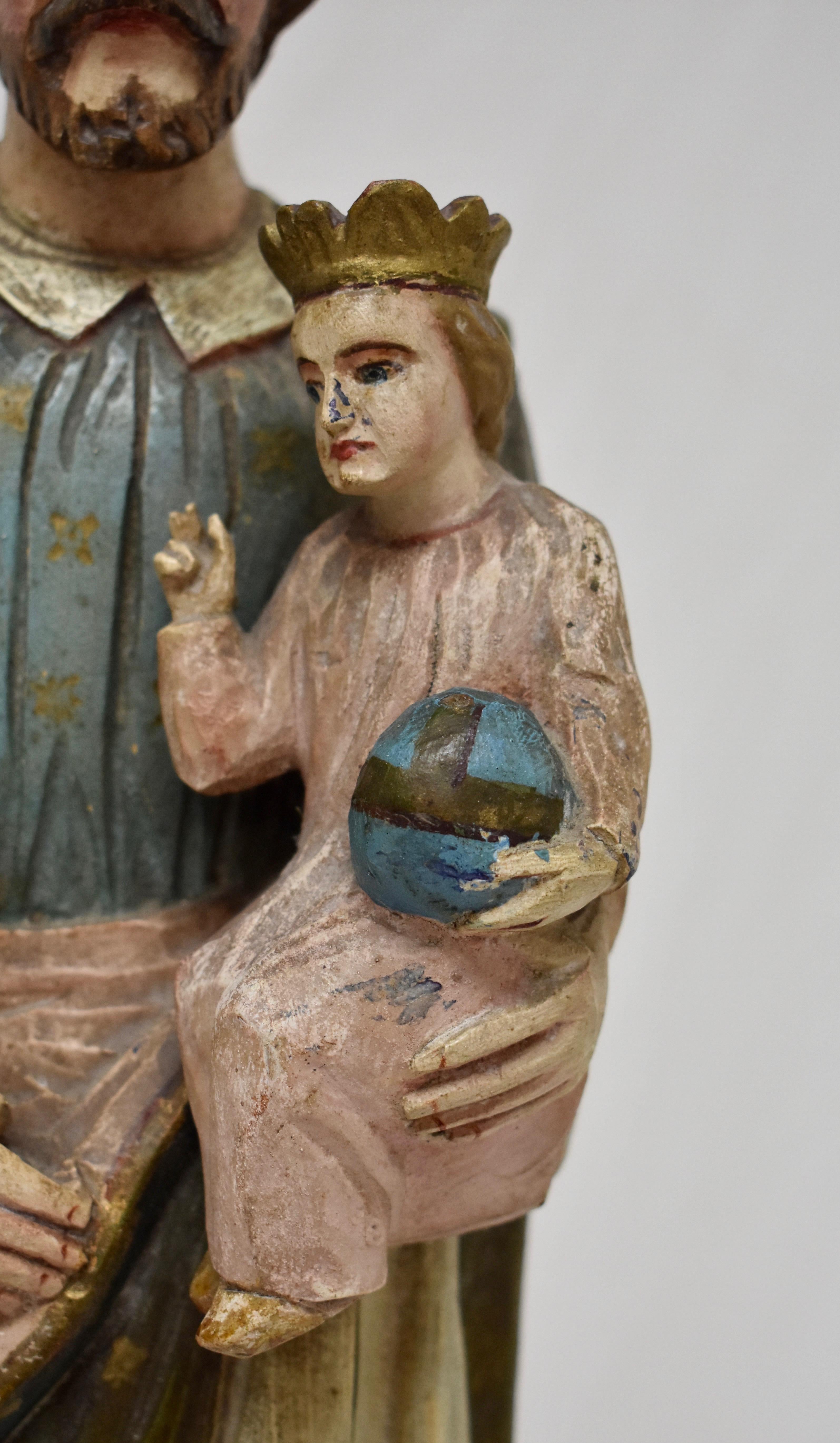 Folk Art Hand Carved Wooden Sculpture of Saint Joseph with Baby Jesus