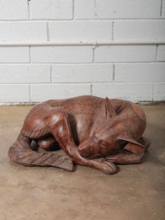 Hand-Carved Wooden Sleeping Dog Sculpture in Curled Form