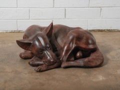 Hand-Carved Wooden Sleeping Dog Sculpture in Curled Resting Form