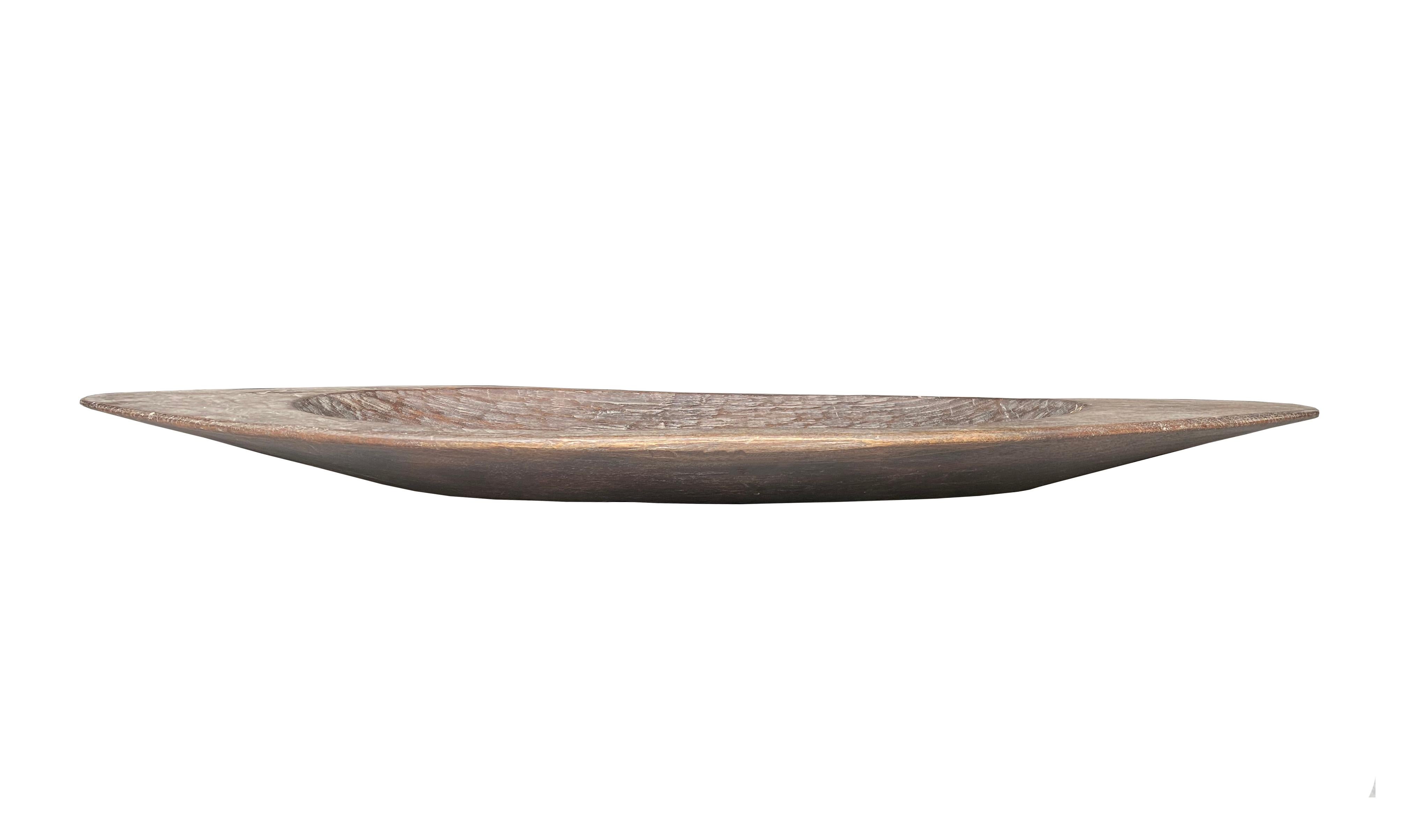 Indonesian Hand-Carved Wooden Tray from the Mentawai Tribe of Indonesia, Mid-20th Century 